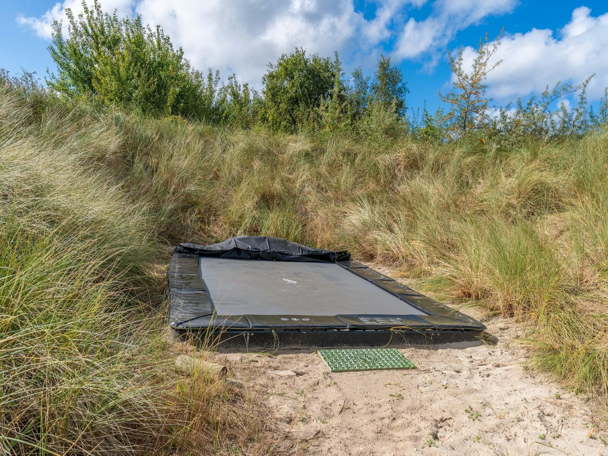 De tuin van Strandvilla Hygge in Den Burg