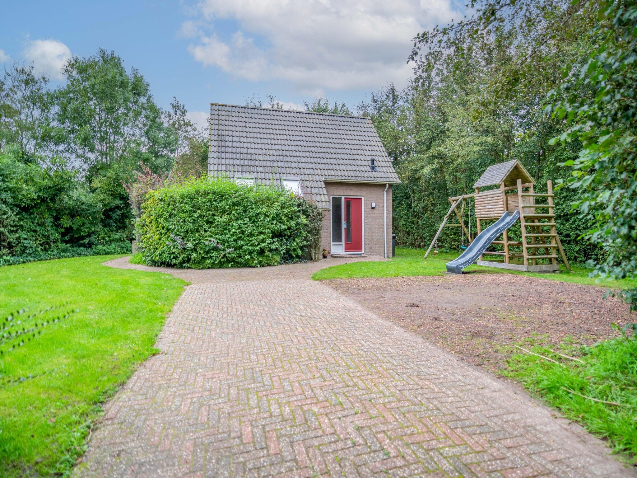 De tuin van Nieuwlanderweg 51 in De Waal