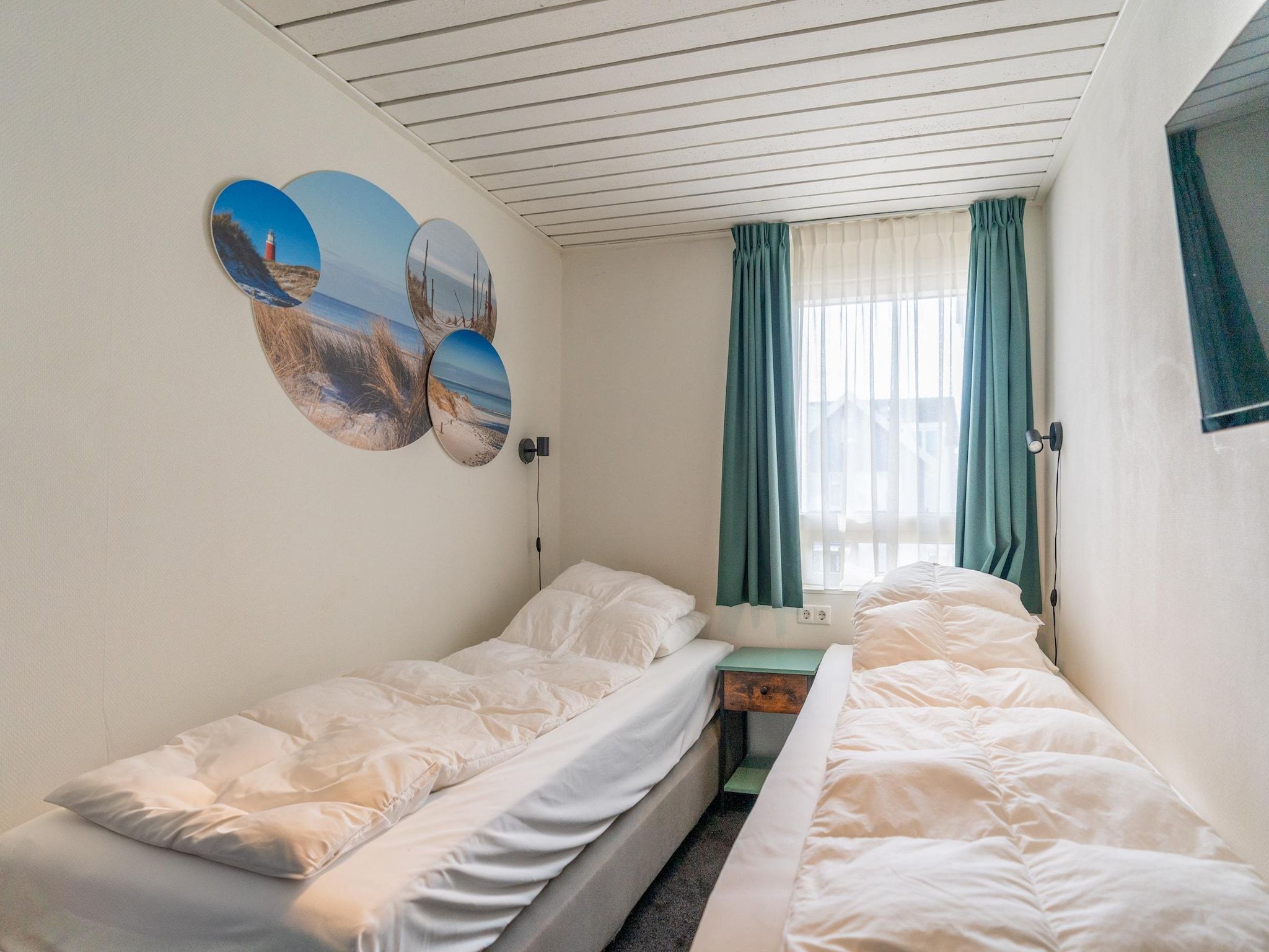 Een slaapkamer van De Anna 220 - Zand in De Koog
