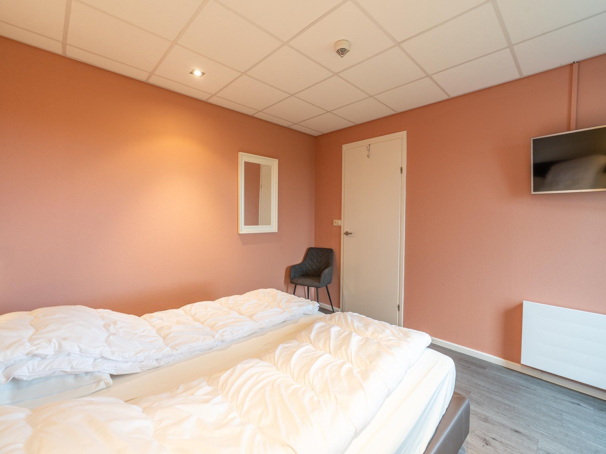 Een slaapkamer van Juliana 028 in De Koog