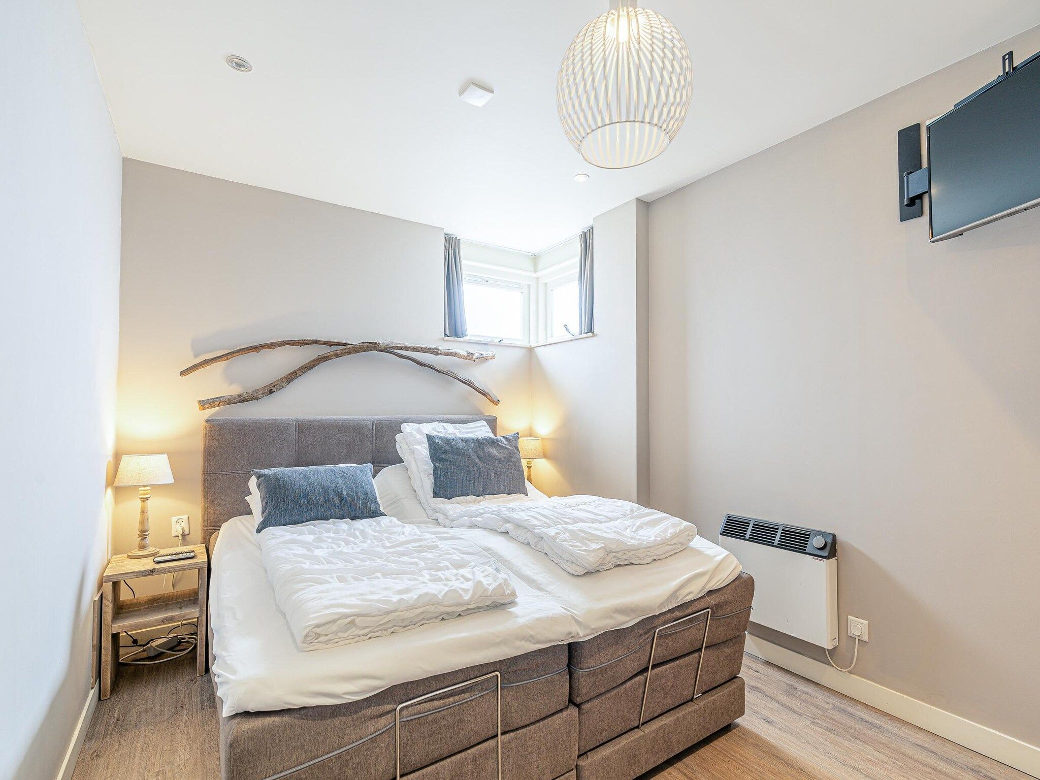 Een slaapkamer van Juliana 034 in De Koog