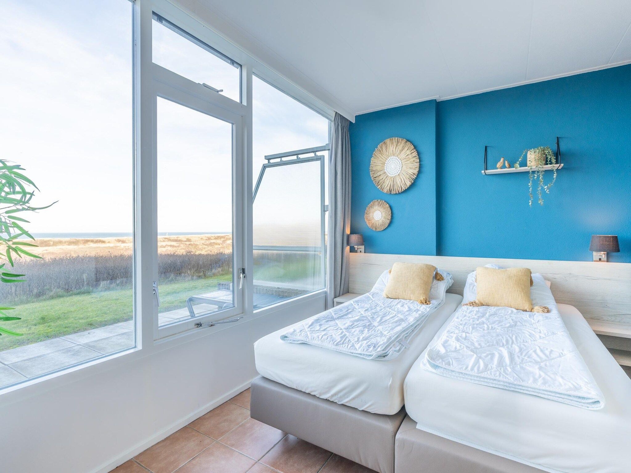 Een slaapkamer van Juliana 062 in De Koog