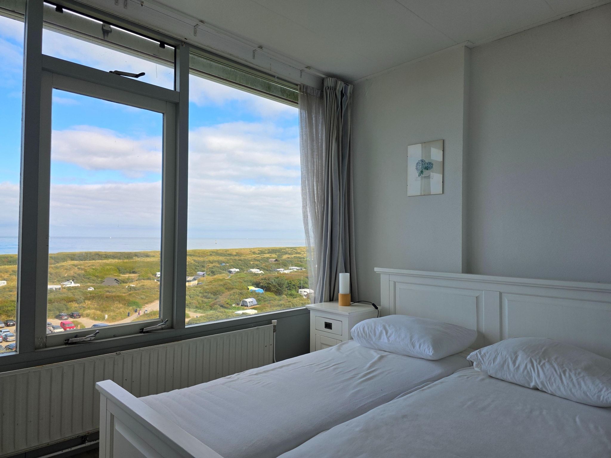 Een slaapkamer van Juliana 162 in De Koog