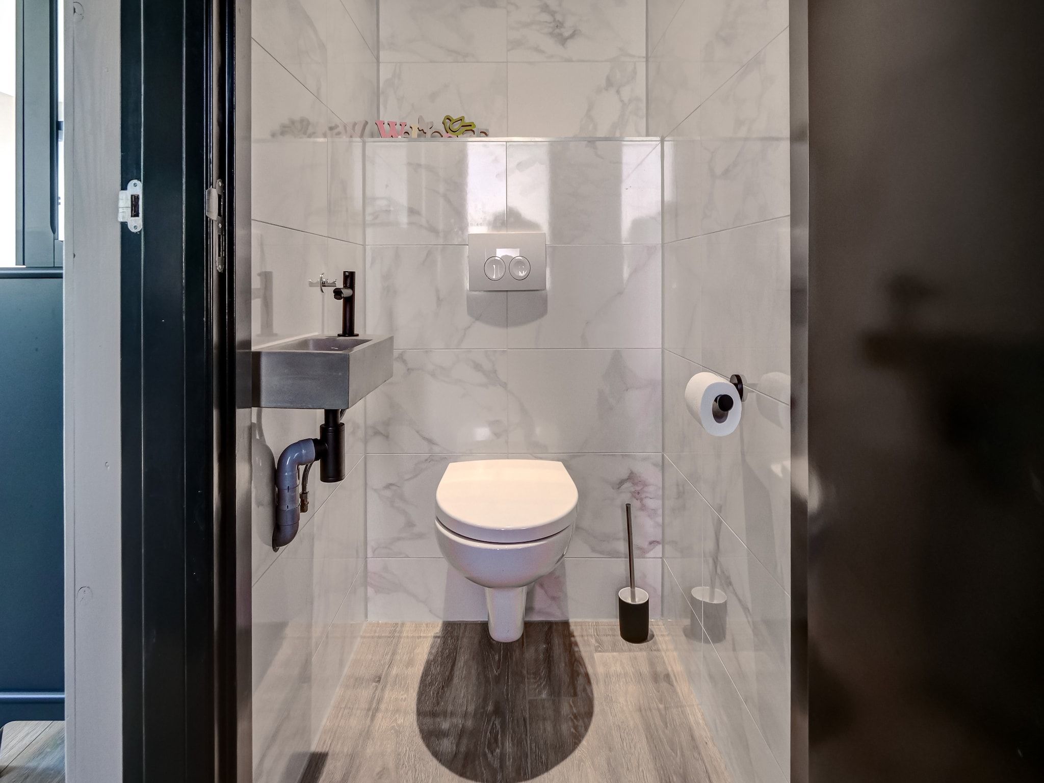De badkamer van Huis Zee in Julianadorp