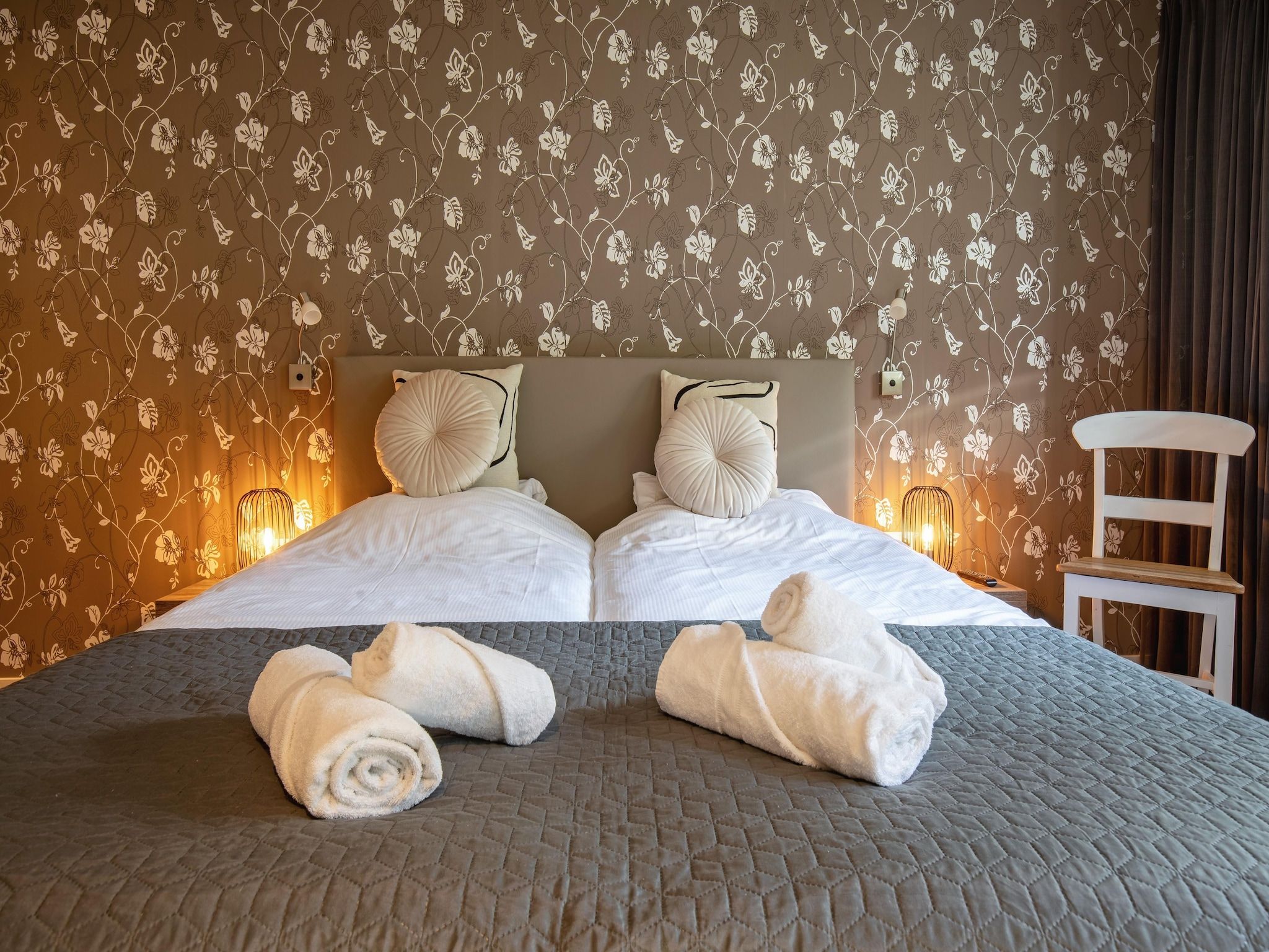 Een slaapkamer van De Witte Parel in Den Burg