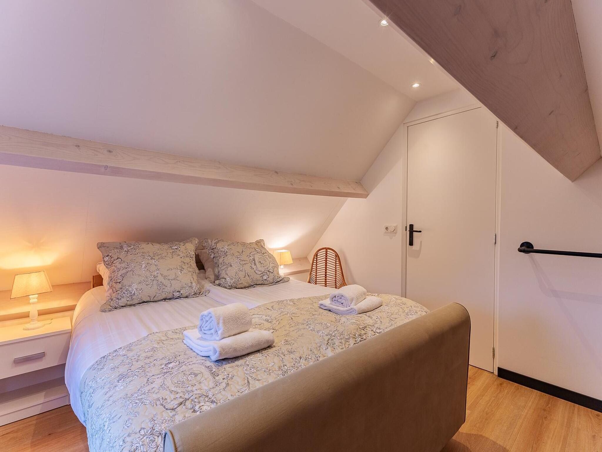Een slaapkamer van Holiday home - Schoolstraat 6a | Vrouwenpolder in Vrouwenpolder