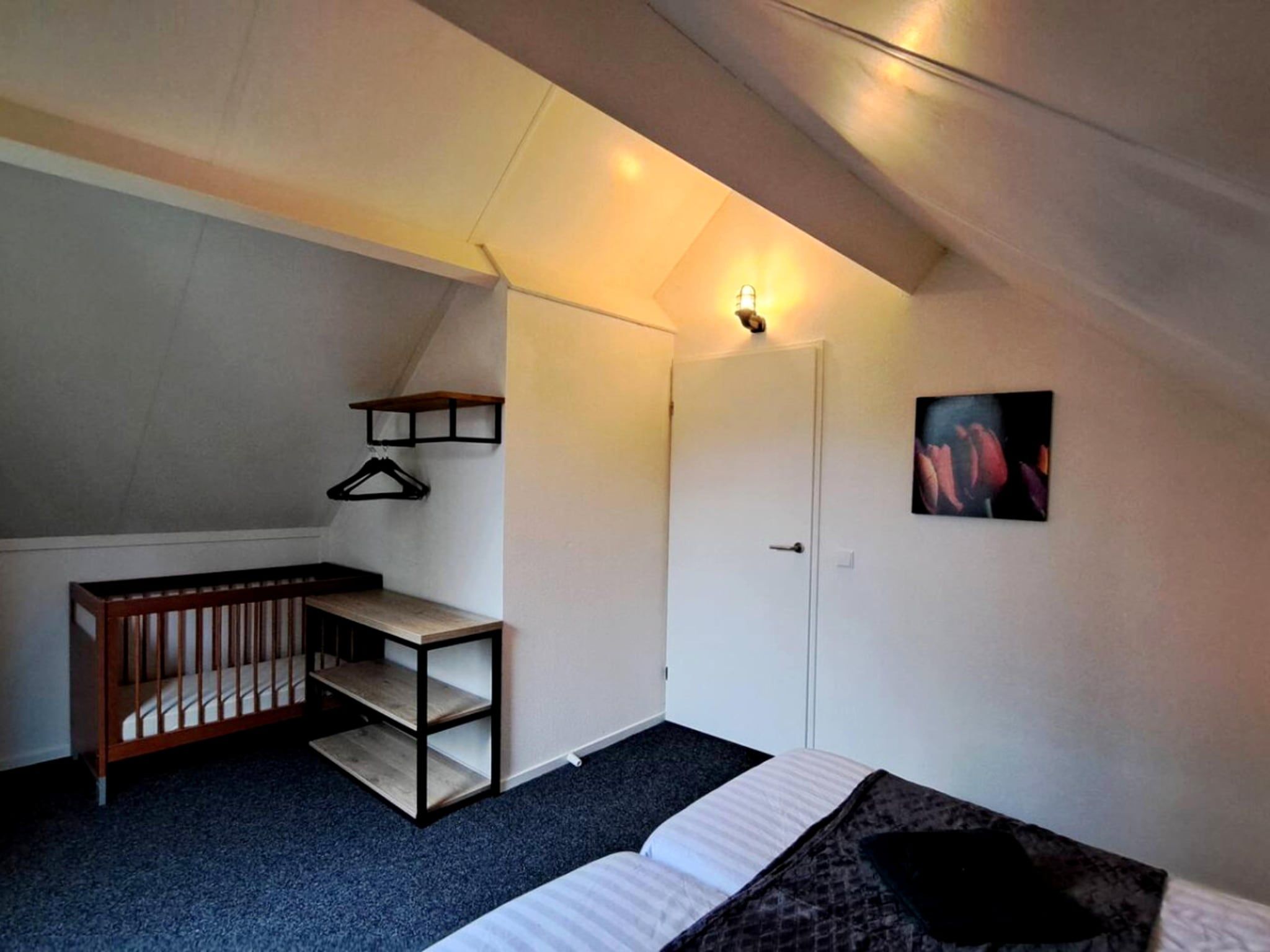 Een slaapkamer van 7 - Persoons Forest 217 Sauna Bungalow (copy) (copy) (copy) in Ewijk