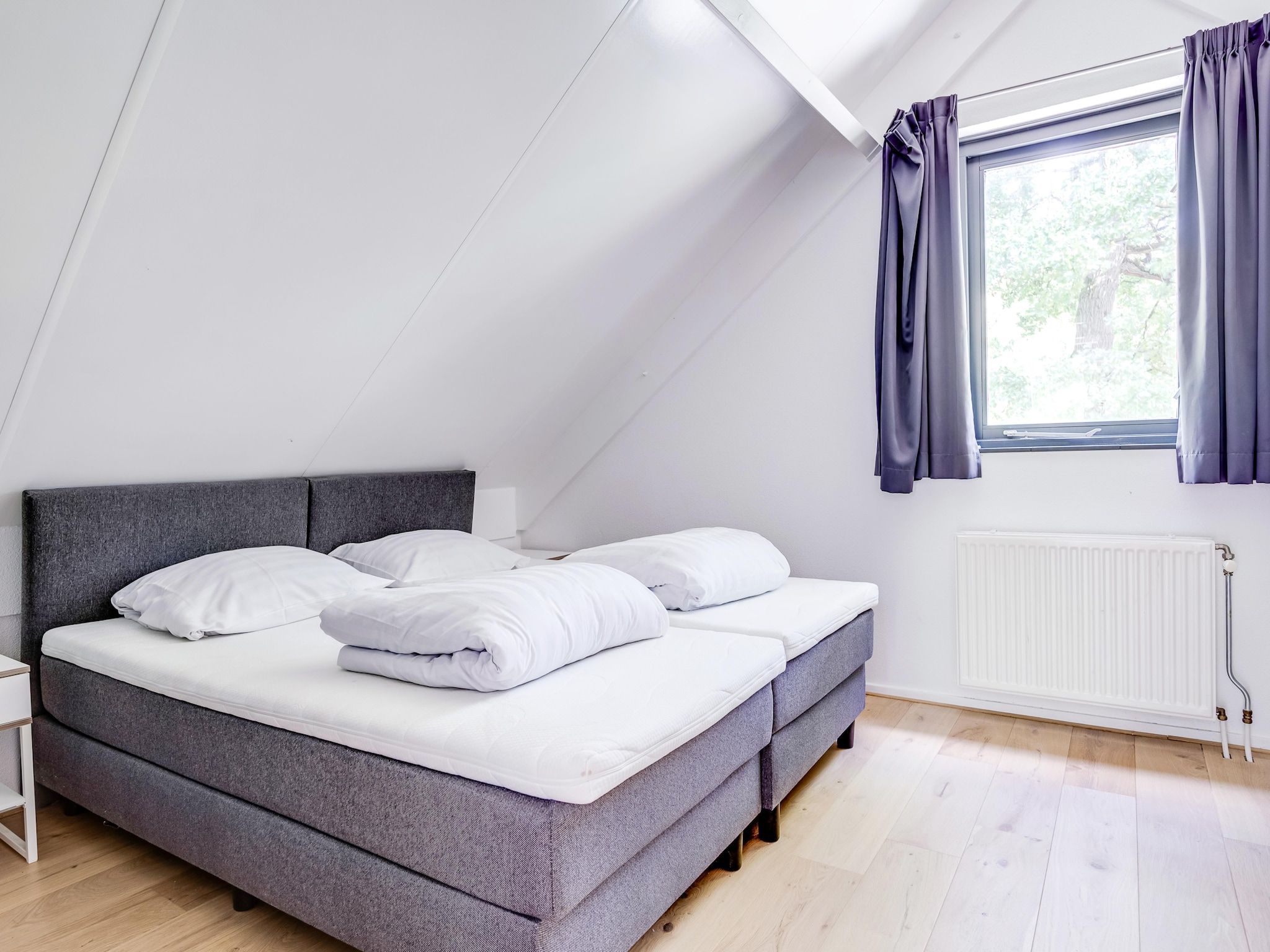 Een slaapkamer van 6 - Persons De Zingende Wilg (copy) (copy) (copy) in Ewijk