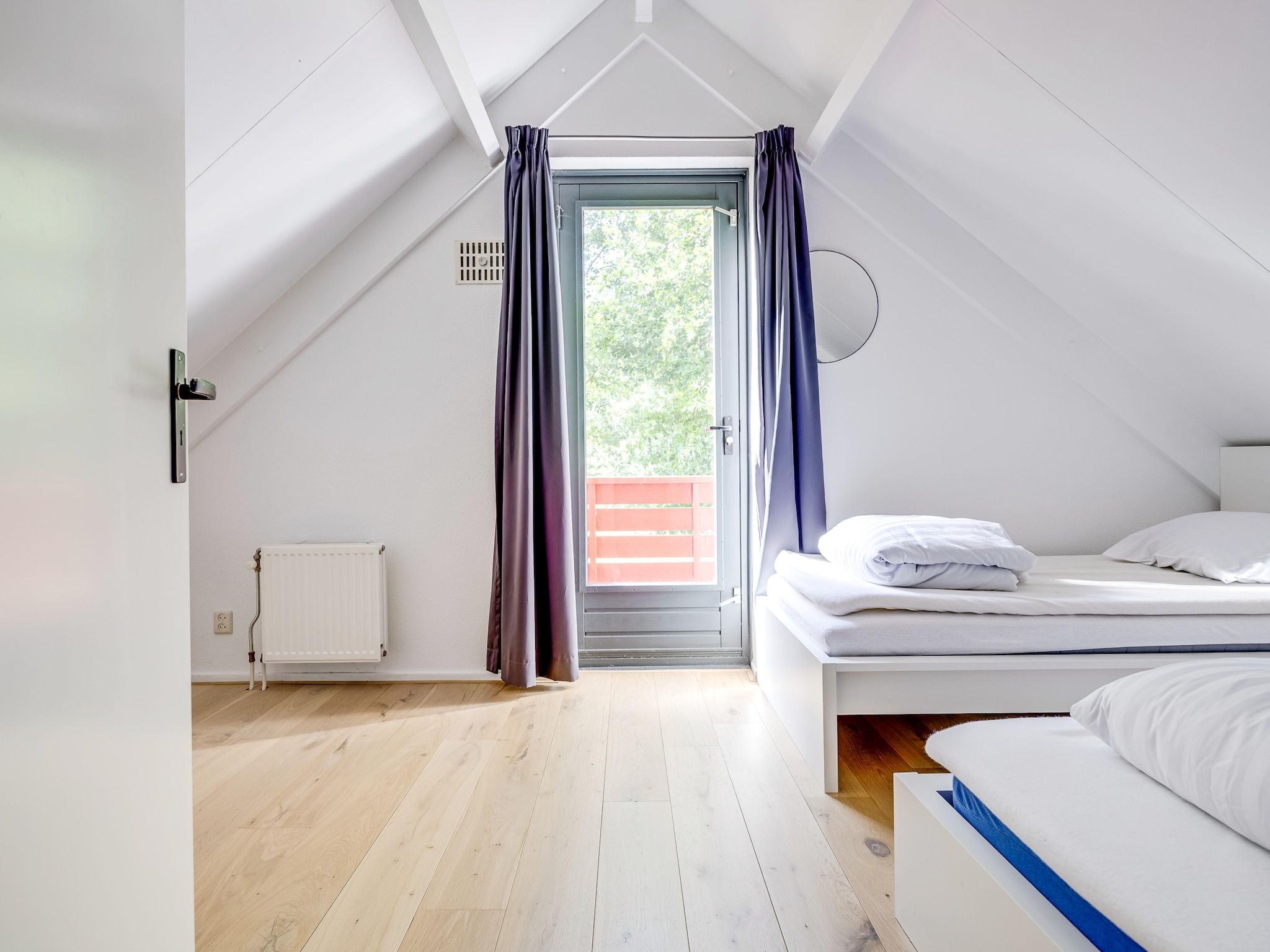 Een slaapkamer van 6 - Persons De Zingende Wilg (copy) (copy) (copy) in Ewijk