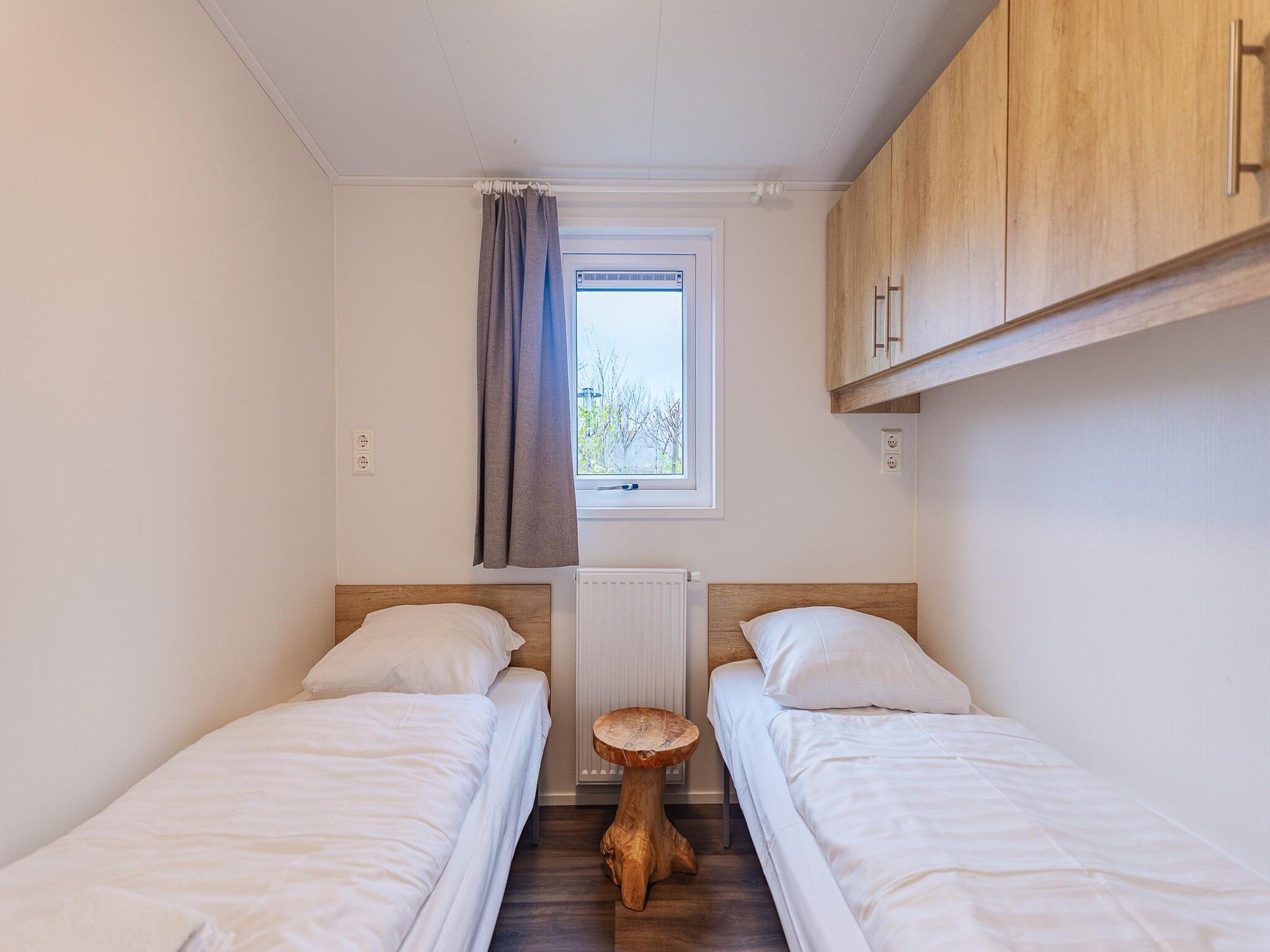 Een slaapkamer van Duinhoeve Chalet Zeeland (huisdier toegestaan) in Burgh-Haamstede