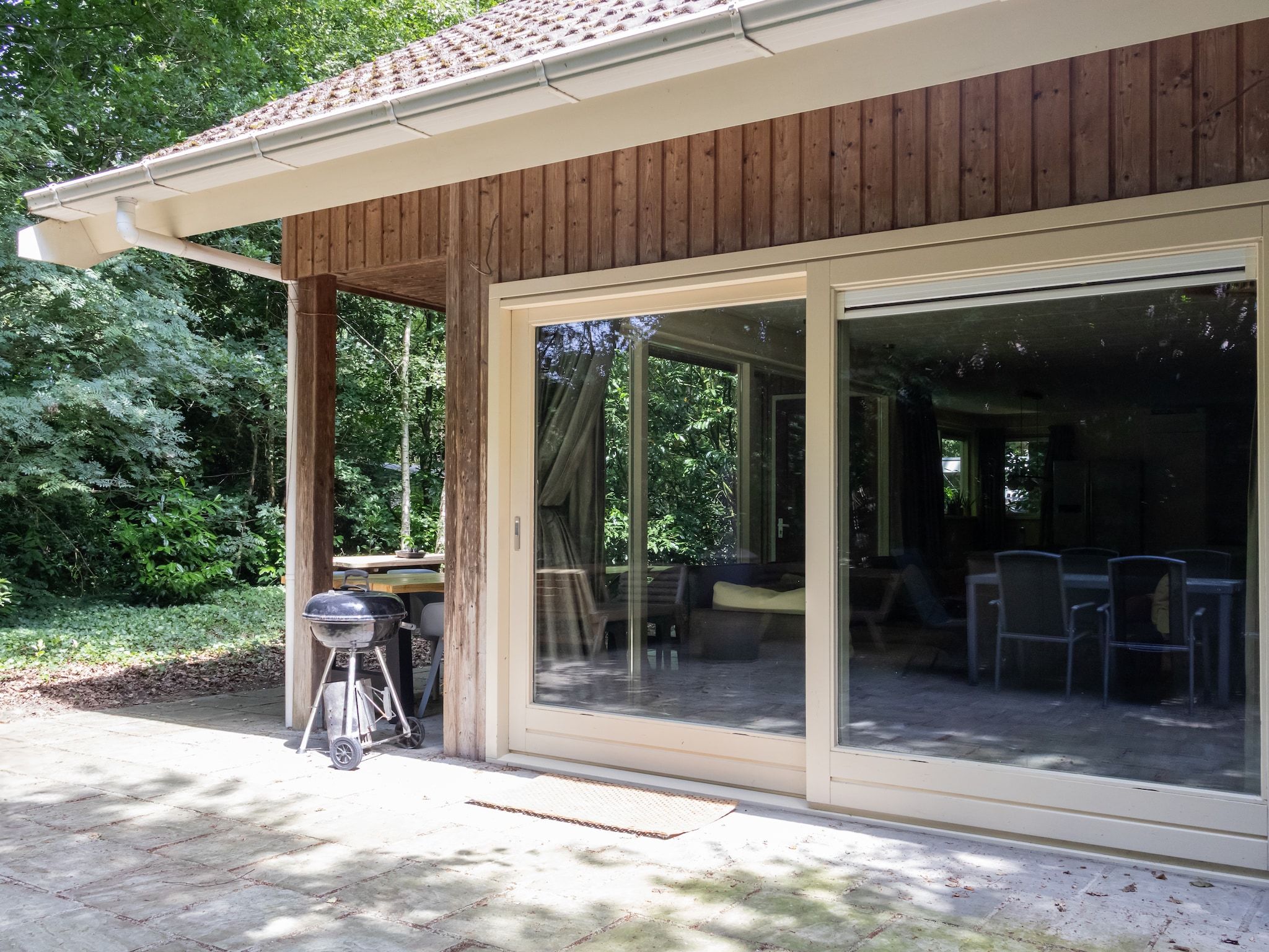 De tuin van Huis in de Bossen in Een