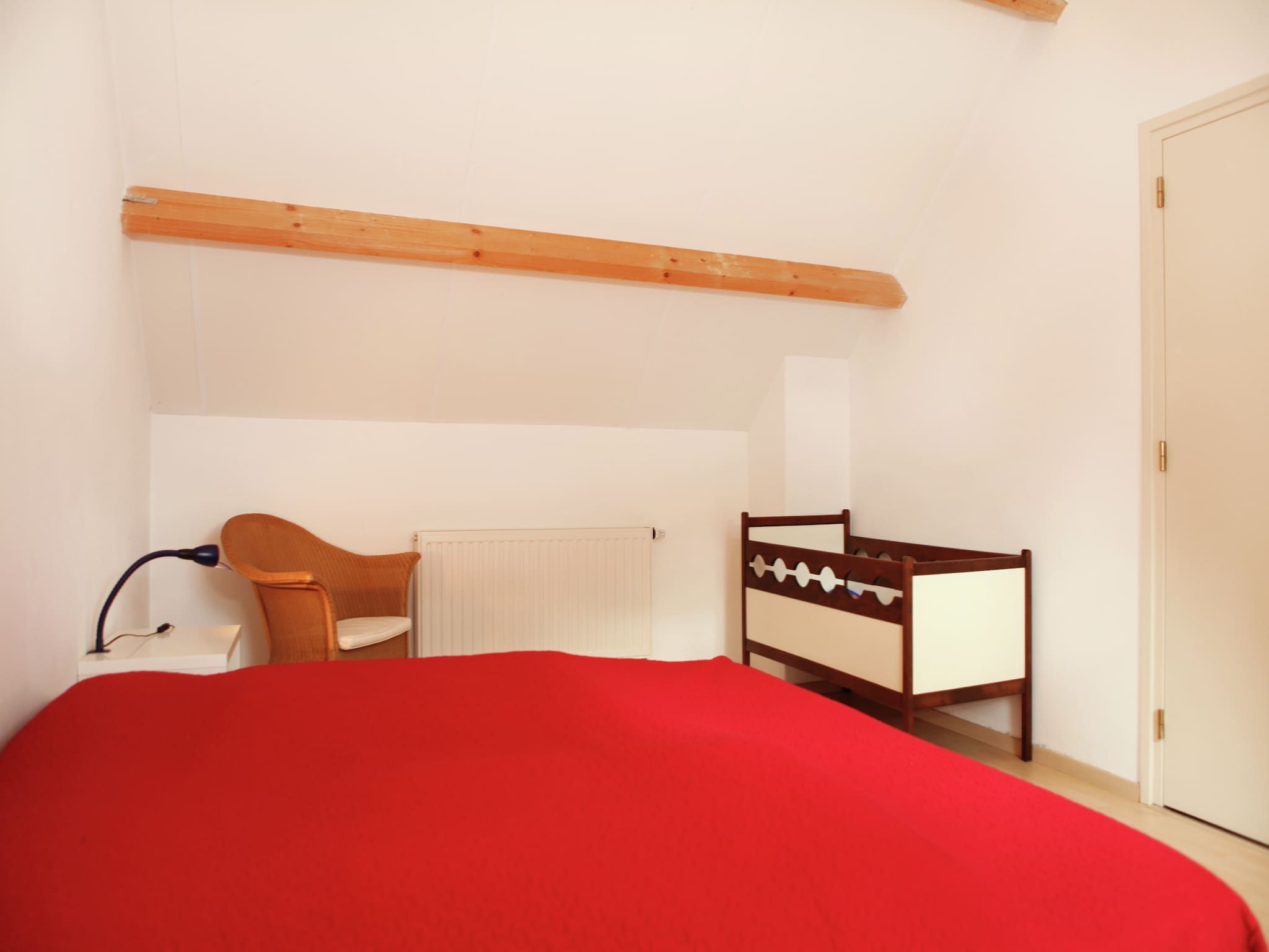 Een slaapkamer van Klein Paarlo in Sint Odilienberg