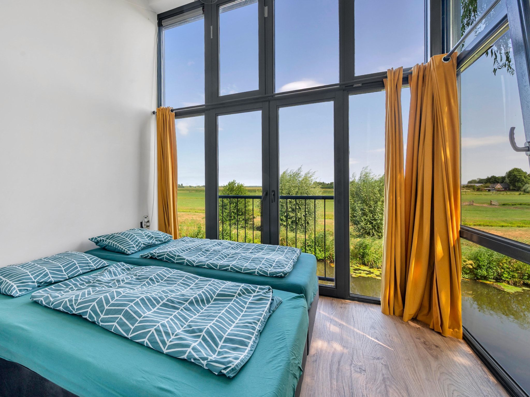 Een slaapkamer van De Waterlelie in Hekendorp