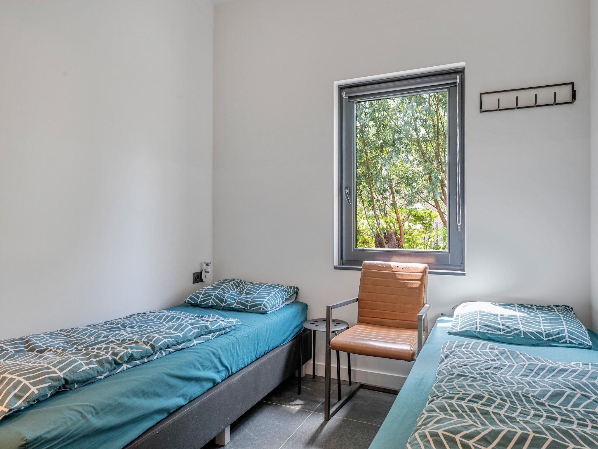 Een slaapkamer van De Waterlelie in Hekendorp