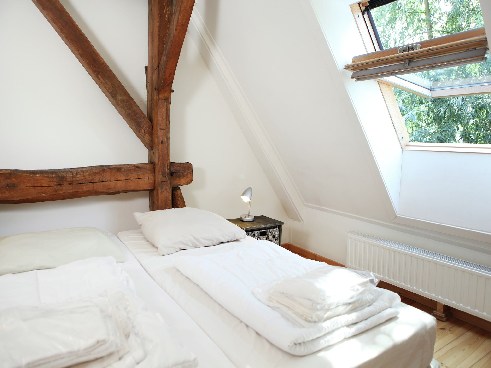 Een slaapkamer van Appartement De Dorsvloer in Eede