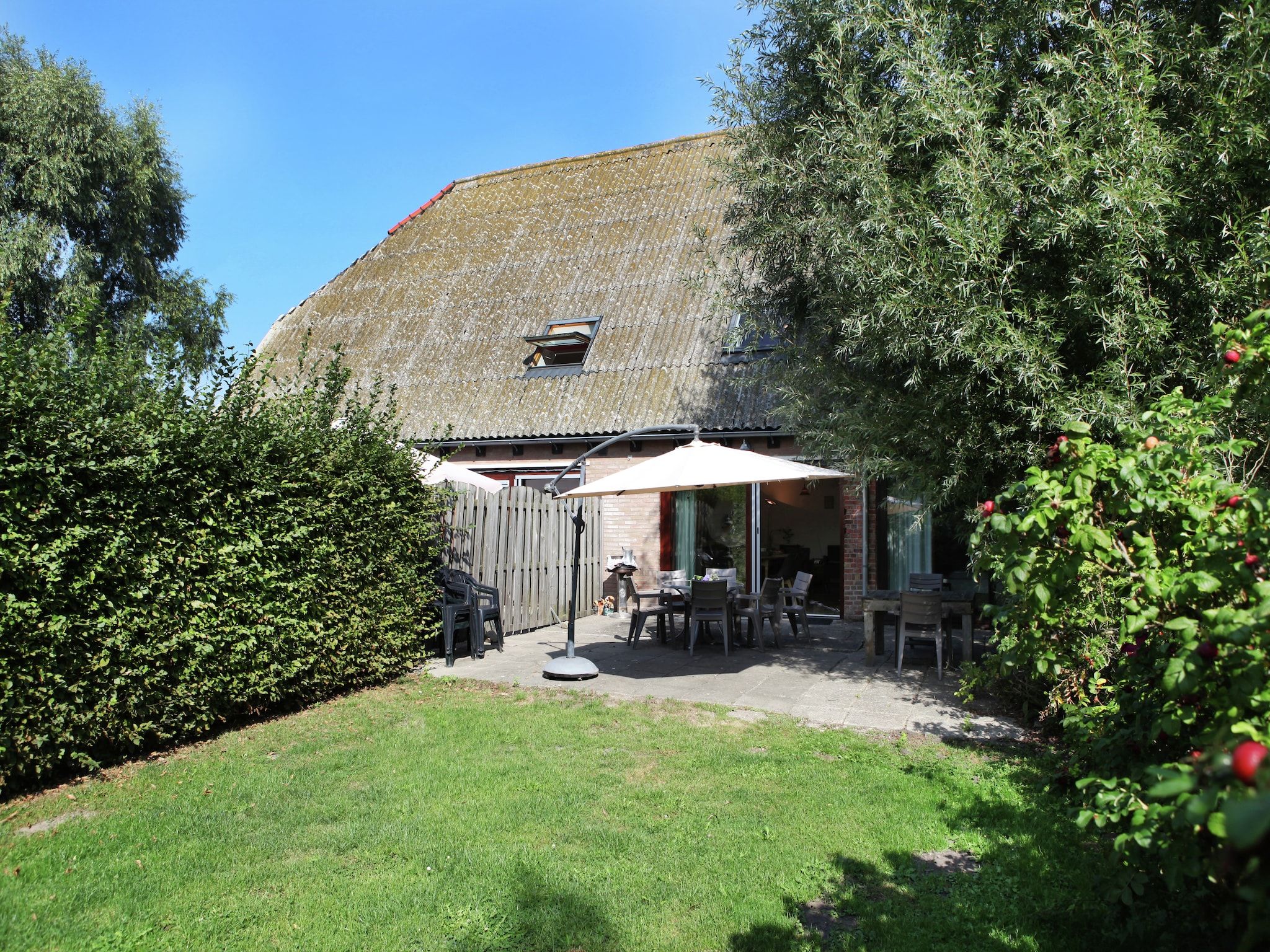 De tuin van Appartement De Dorsvloer in Eede