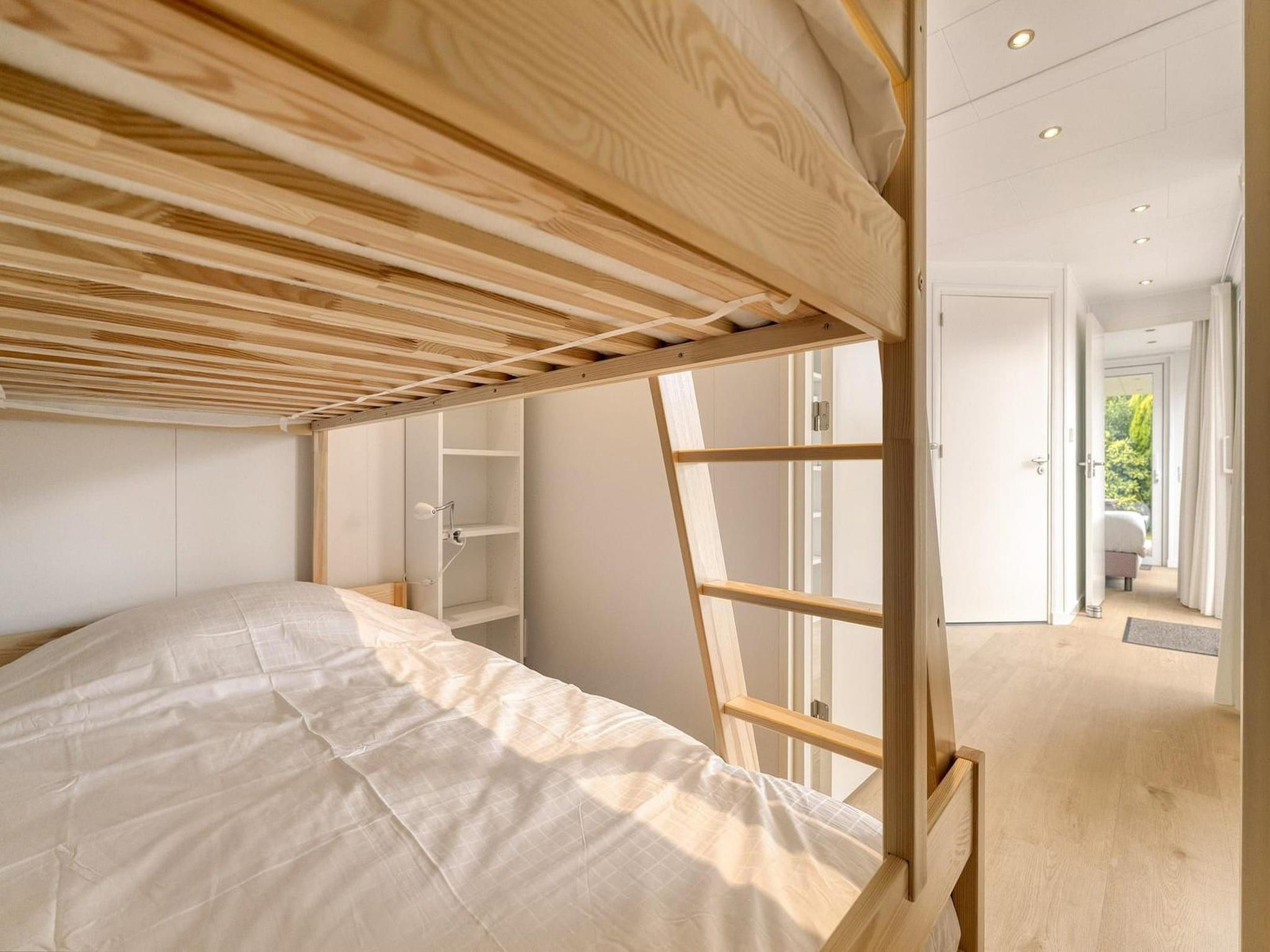 Een slaapkamer van Eureka 57 in Sint Maartensvlotbrug