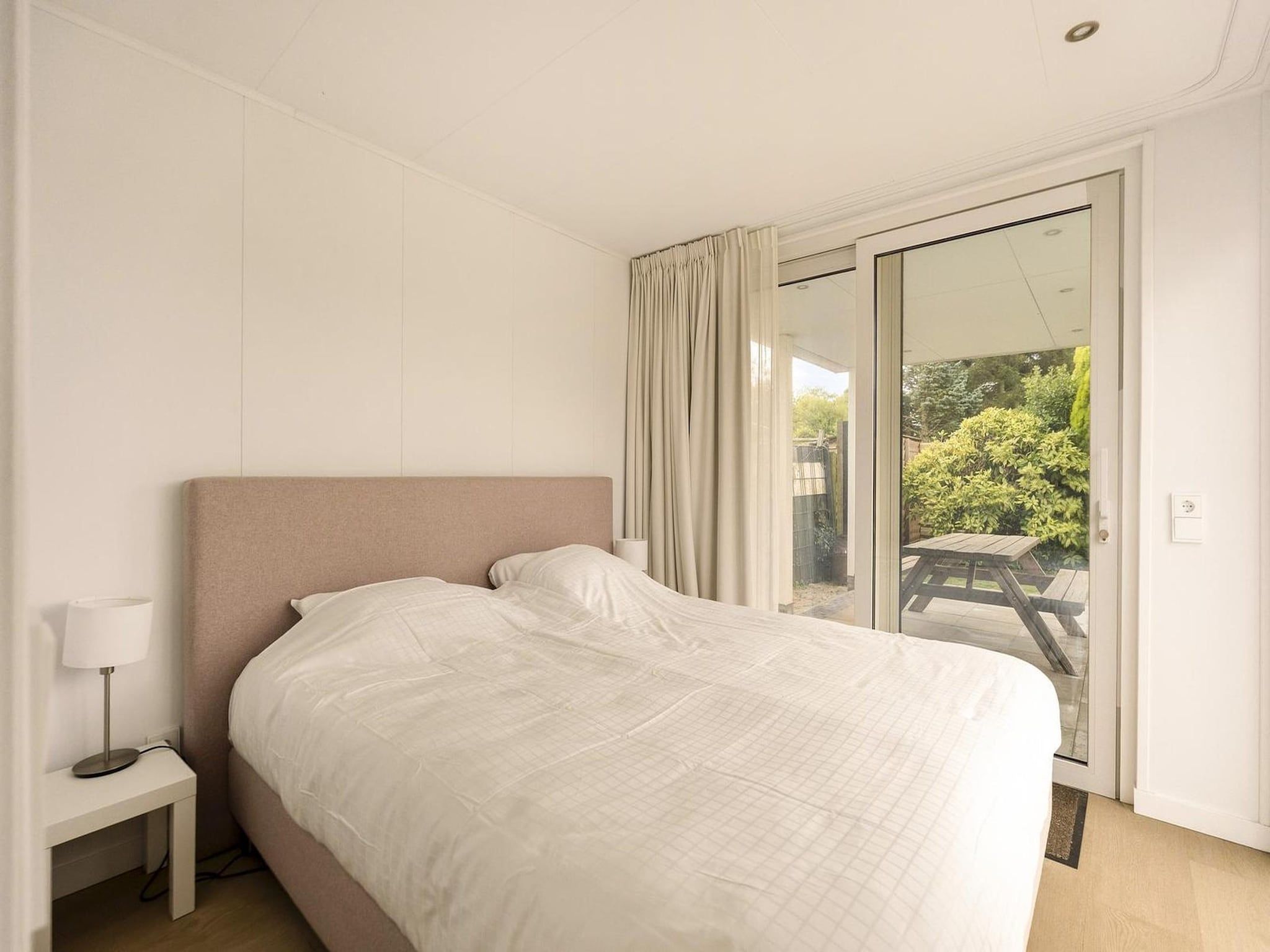 Een slaapkamer van Eureka 57 in Sint Maartensvlotbrug