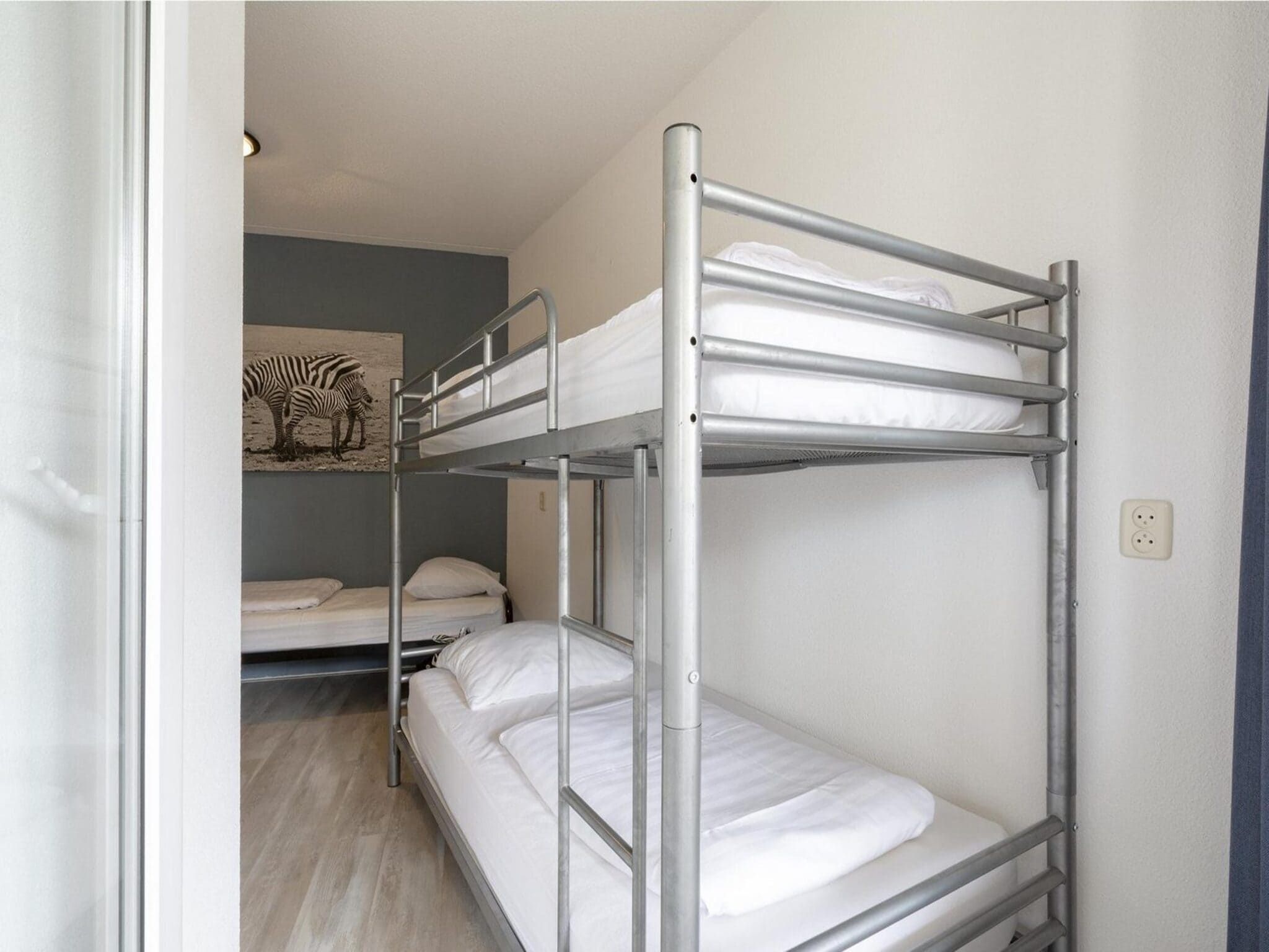 Een slaapkamer van Residence Juliana 58 | Julianadorp aan Zee | Balcony (copy) in Julianadorp
