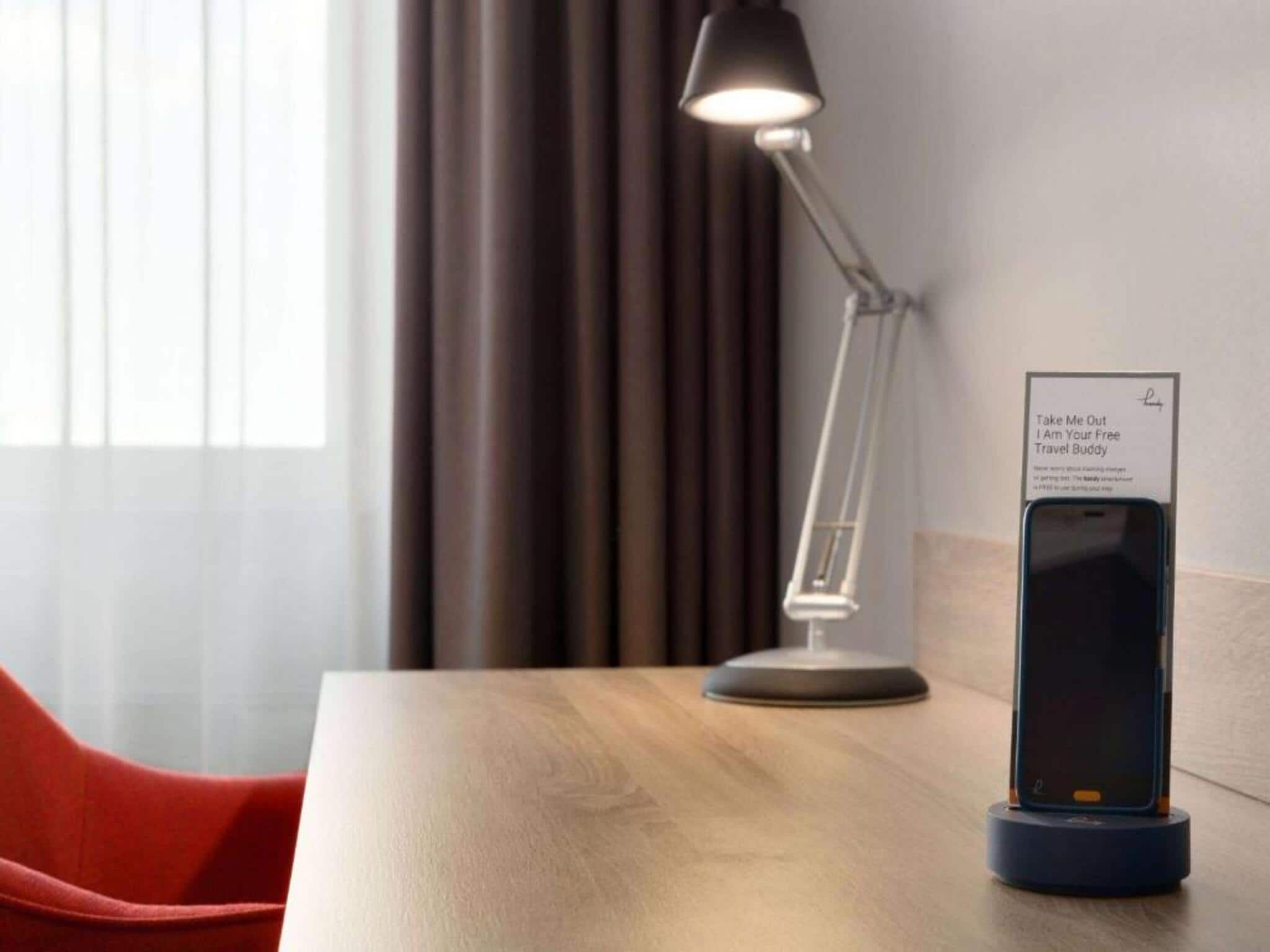 Een slaapkamer van Sunday Hotel Amsterdam Airport Schiphol in Badhoevedorp,