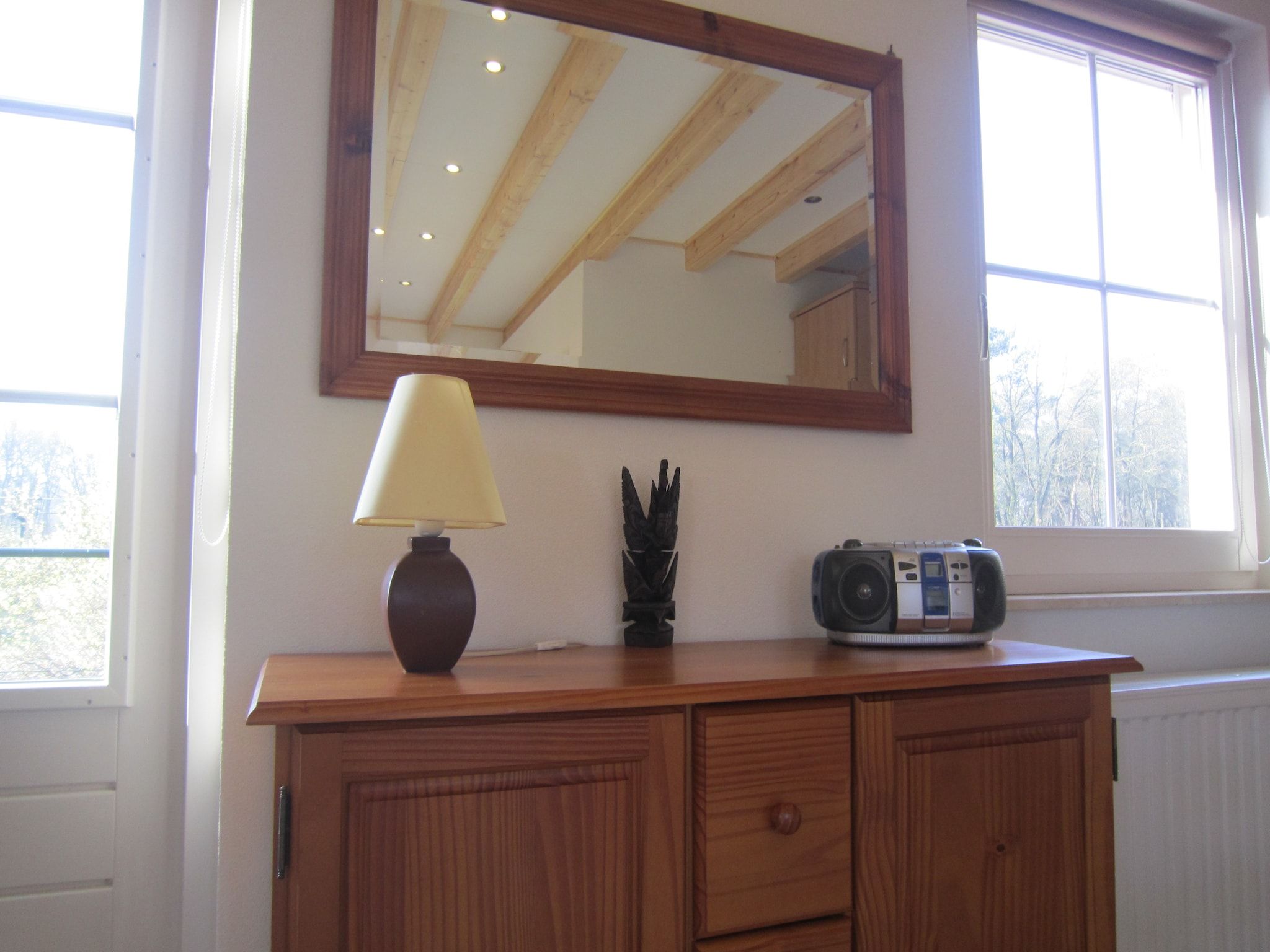 De woonkamer van Le Petit Miracle in Well