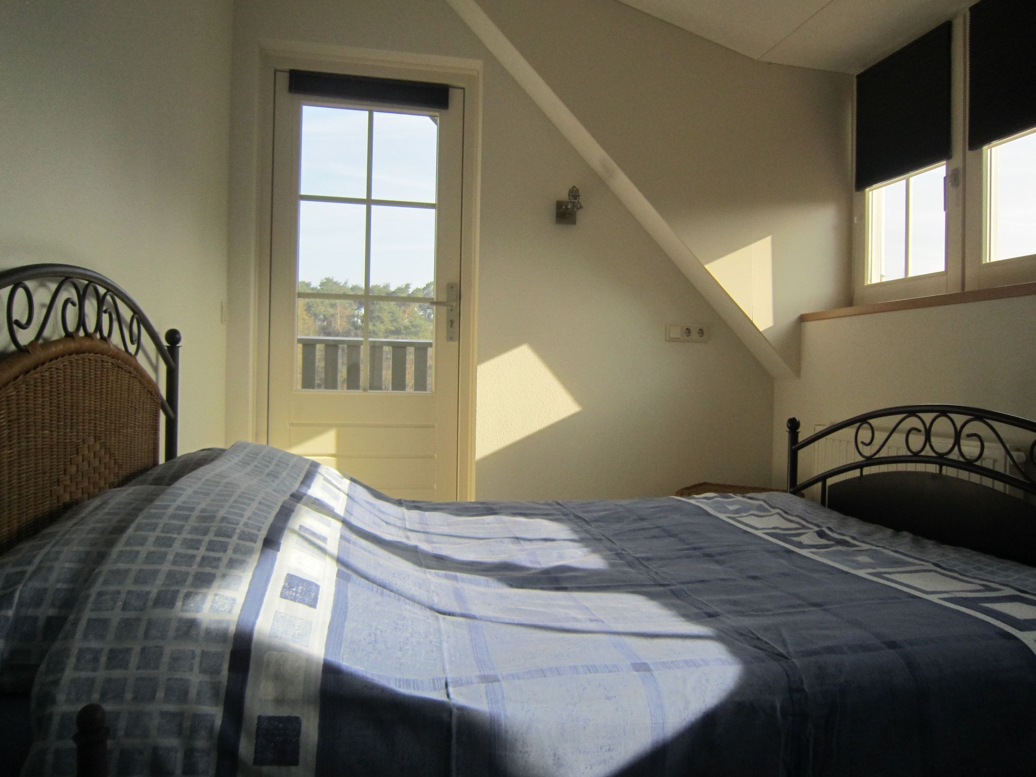 Een slaapkamer van Le Petit Miracle in Well