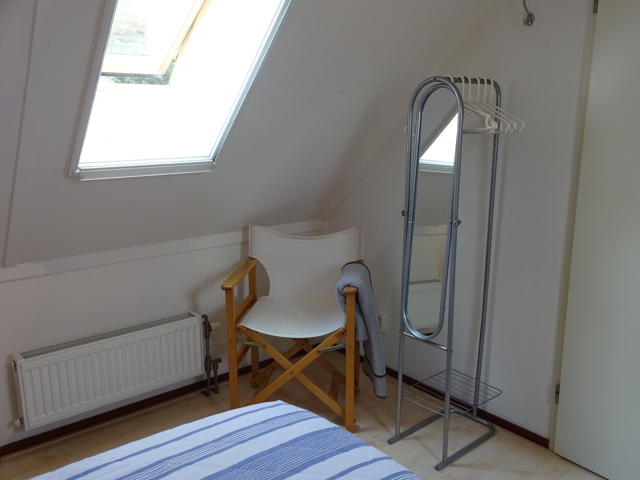 Een slaapkamer van Villa ten Hoeve in Steendam