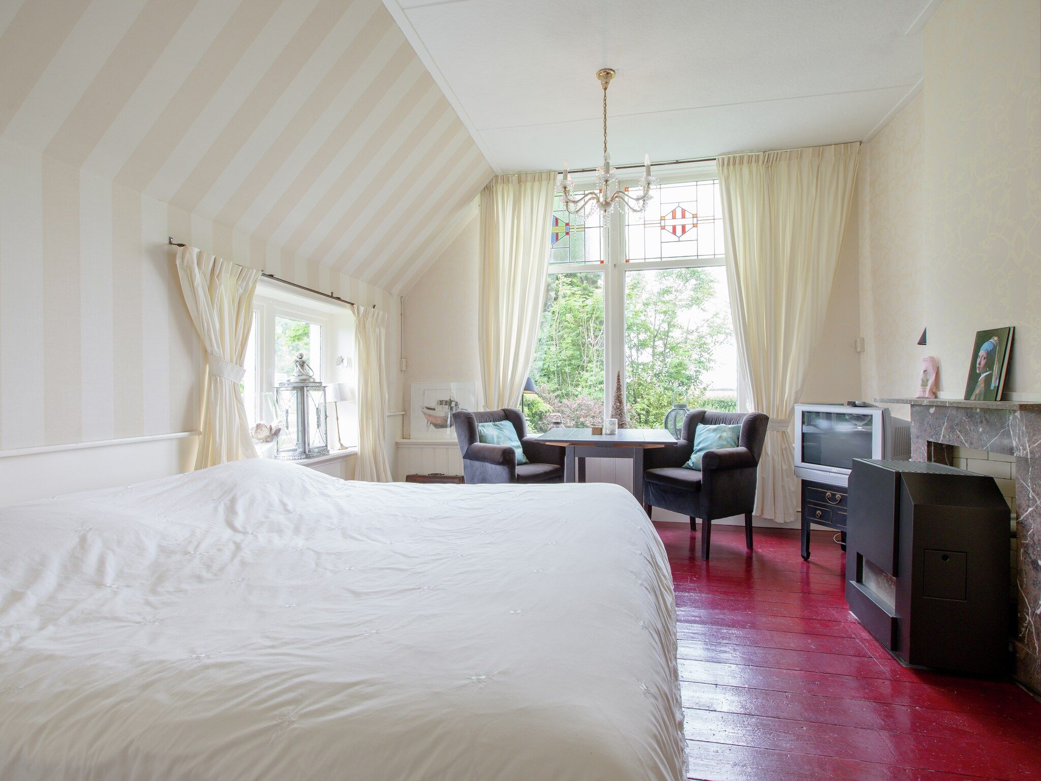 Een slaapkamer van De Goudsbloem in Molkwerum