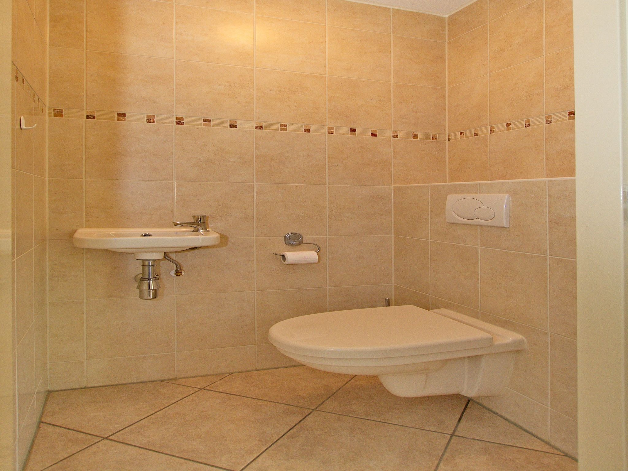 De badkamer van Vakantiepark Duinrust 1 in Noordwijk aan zee