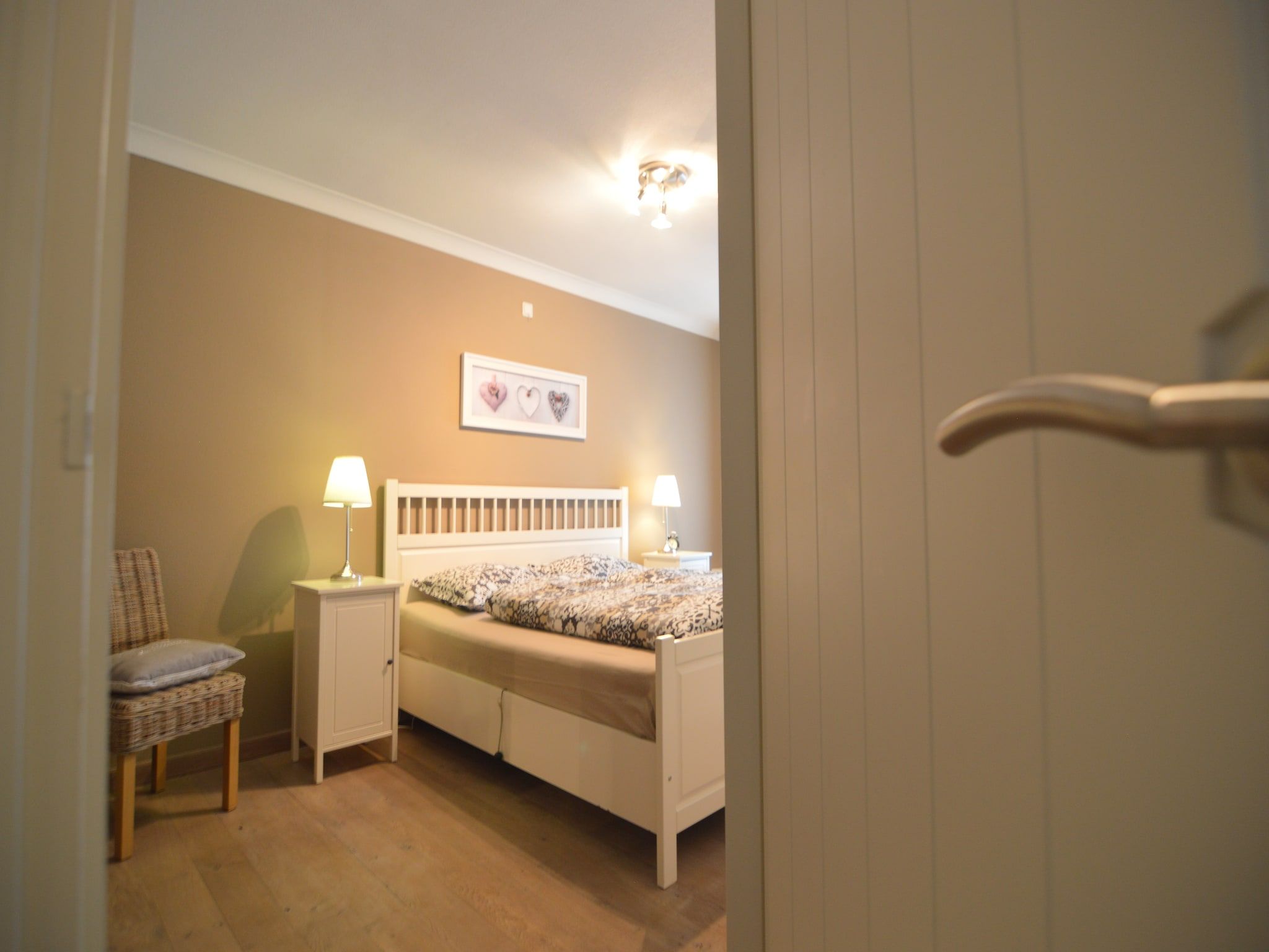 Een slaapkamer van Maasheuvel in Roosteren