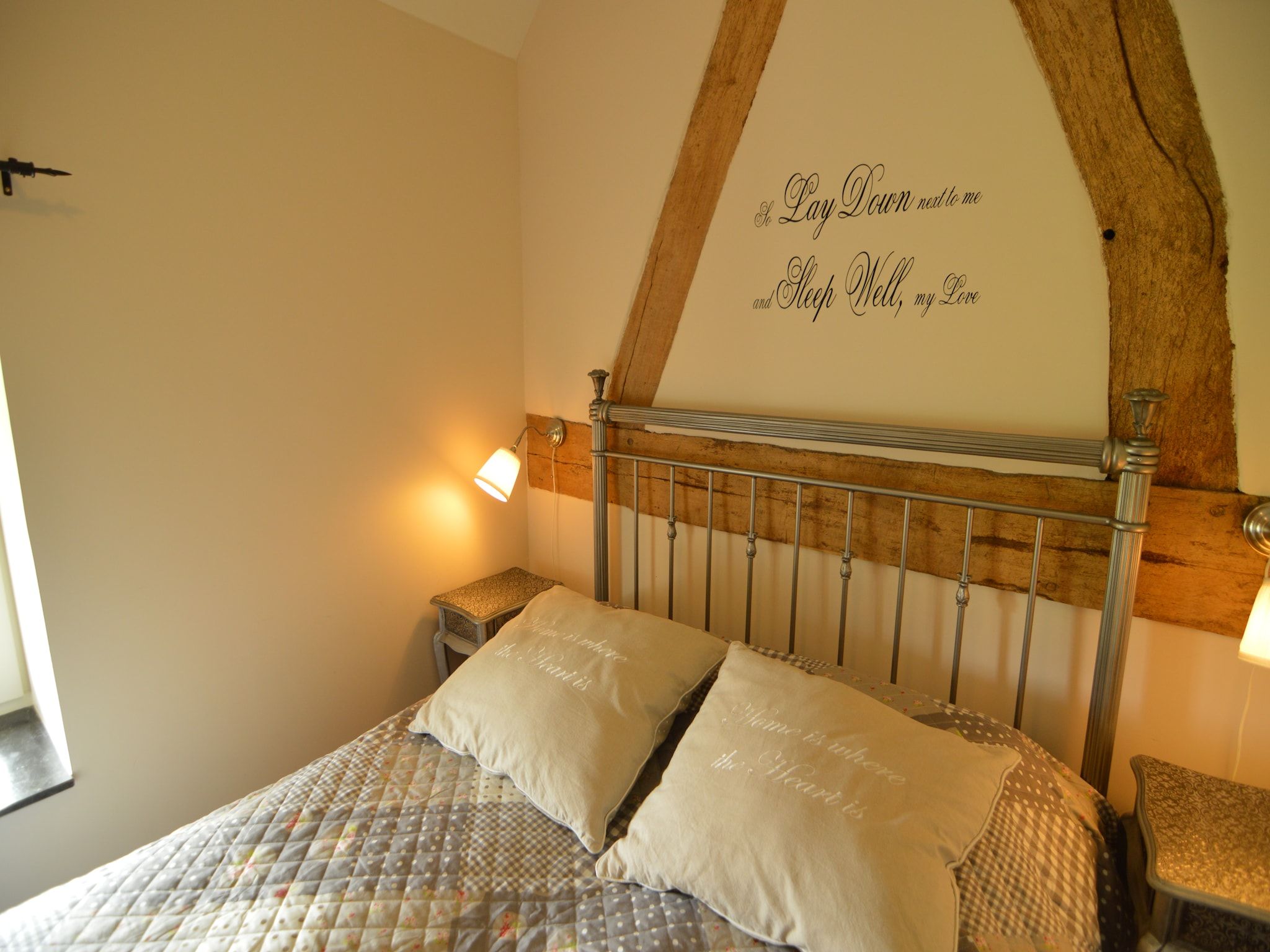 Een slaapkamer van Hoeve A Gen Water - Hummesknupke in Slenaken