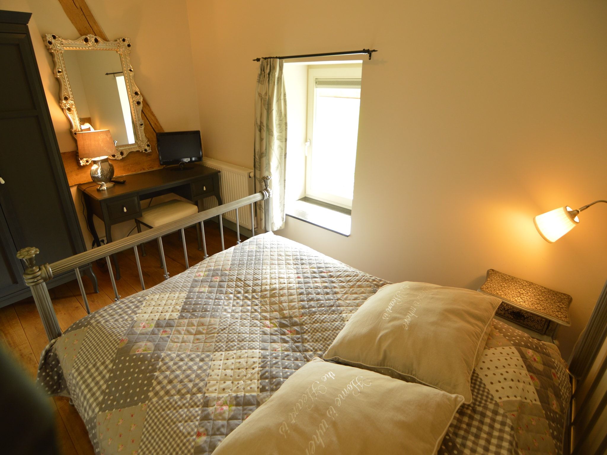 Een slaapkamer van Hoeve A Gen Water - Hummesknupke in Slenaken