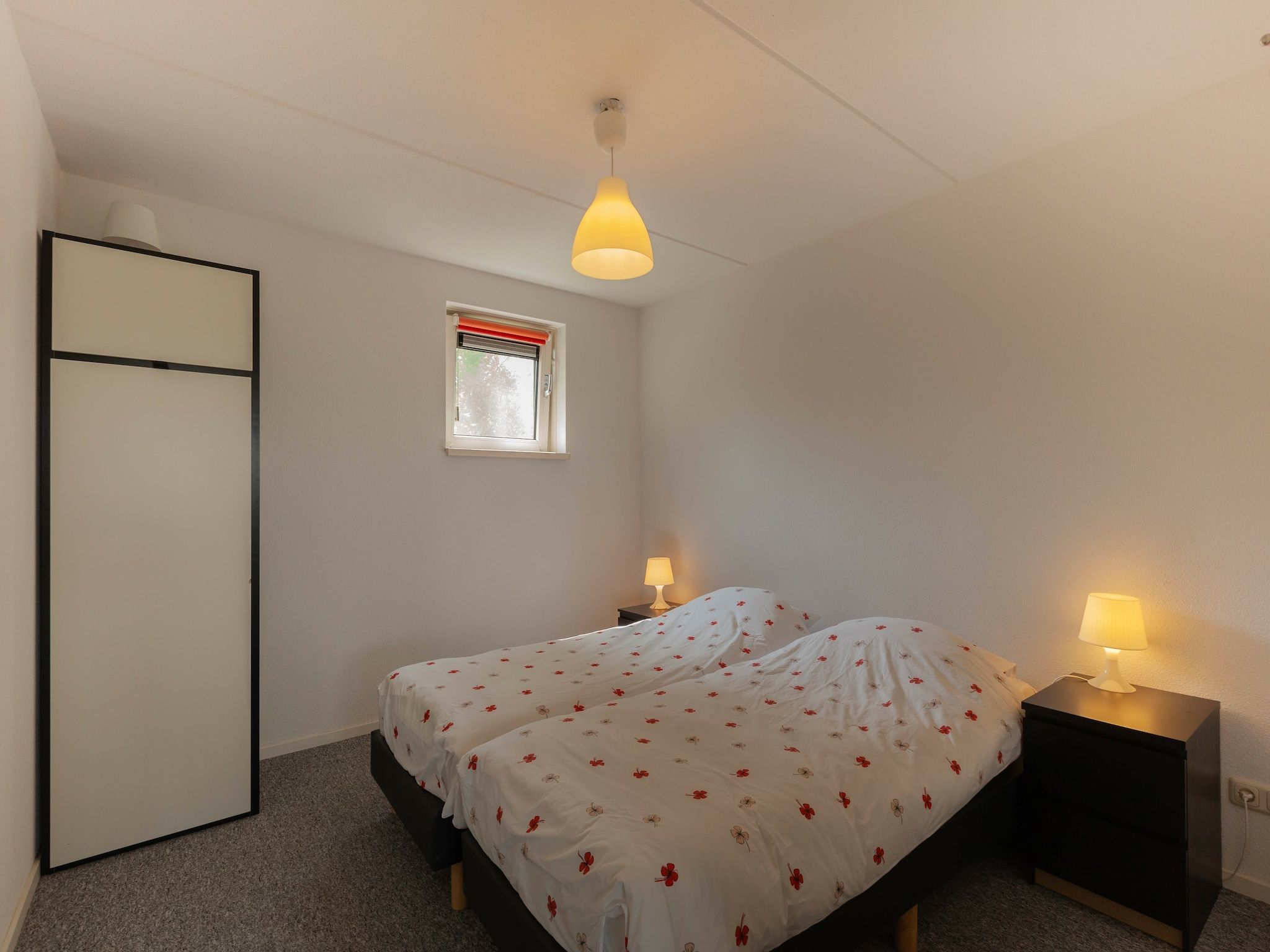 Een slaapkamer van Lyts Sypenstien in Langweer