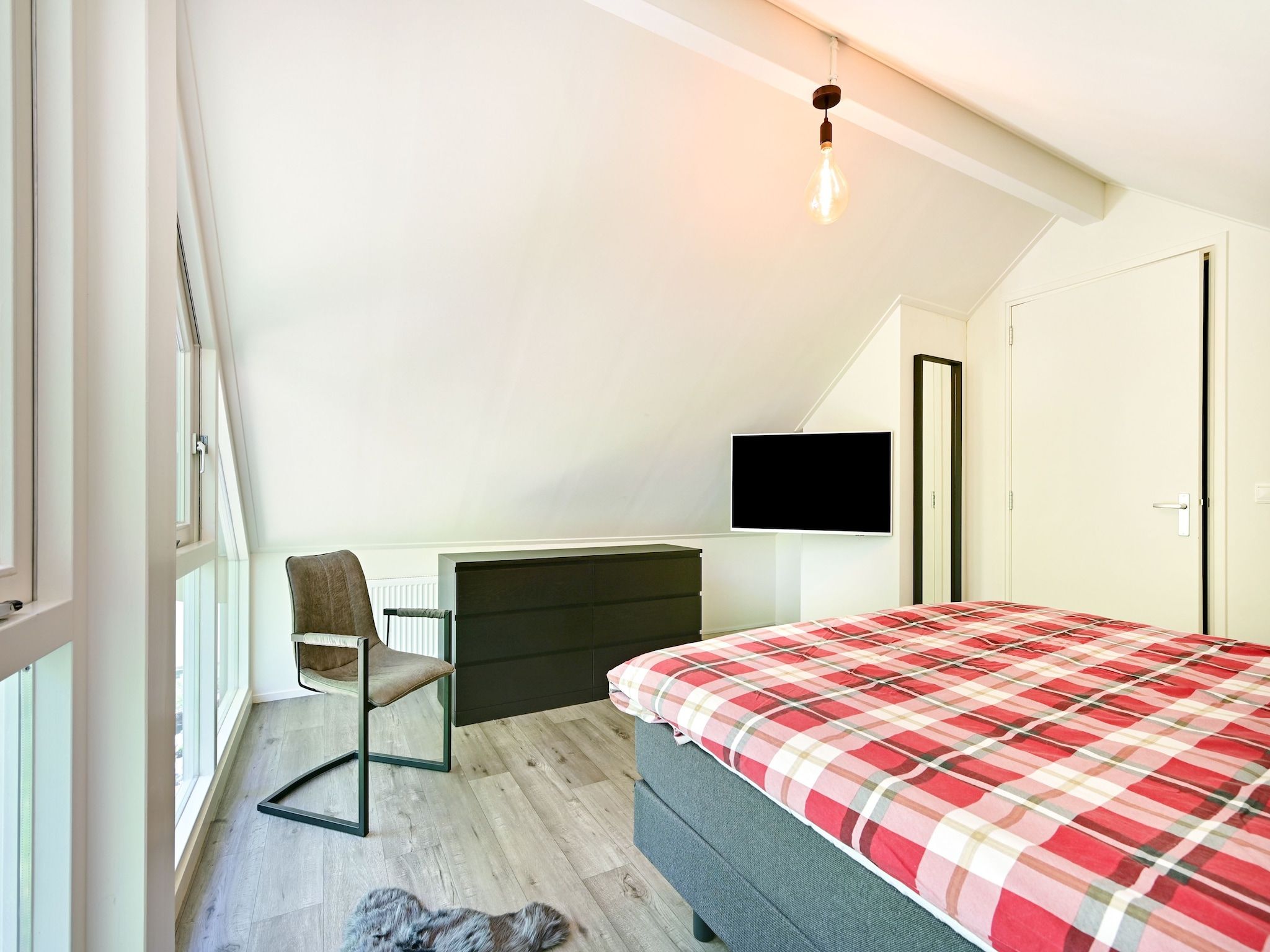 Een slaapkamer van Veldzicht in Reutum-Weerselo