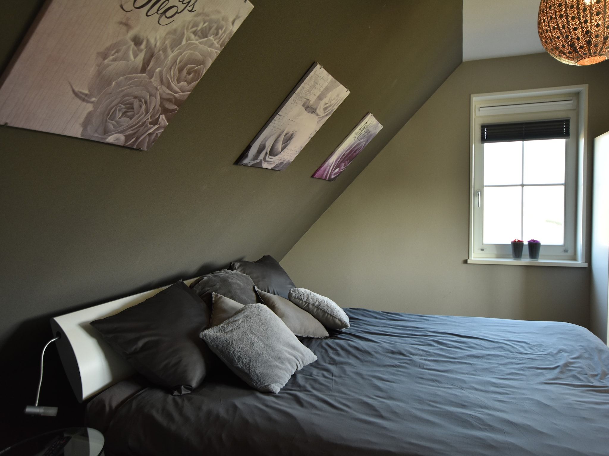 Een slaapkamer van Scoreldame 8-persoons in Schoorldam