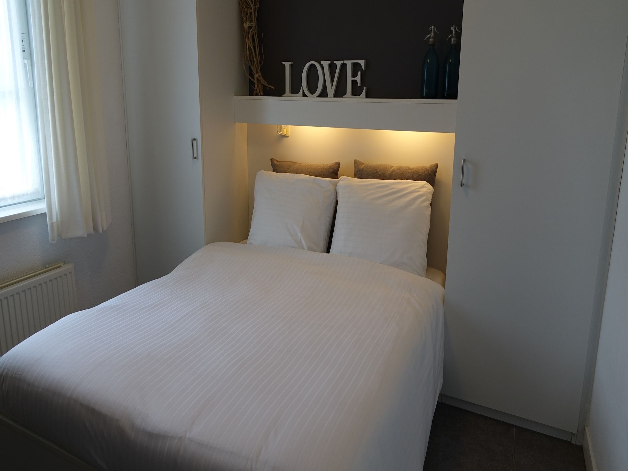 Een slaapkamer van Wellness aan het Water in Eernewolde in Earnewald