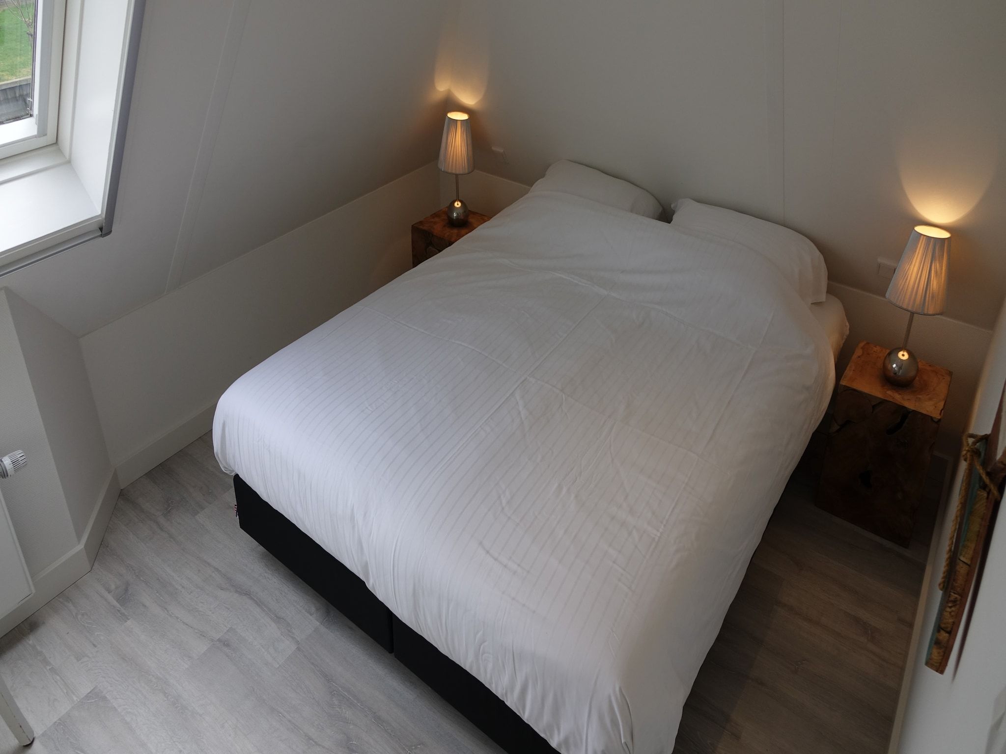 Een slaapkamer van Wellness aan het Water in Eernewolde in Earnewald