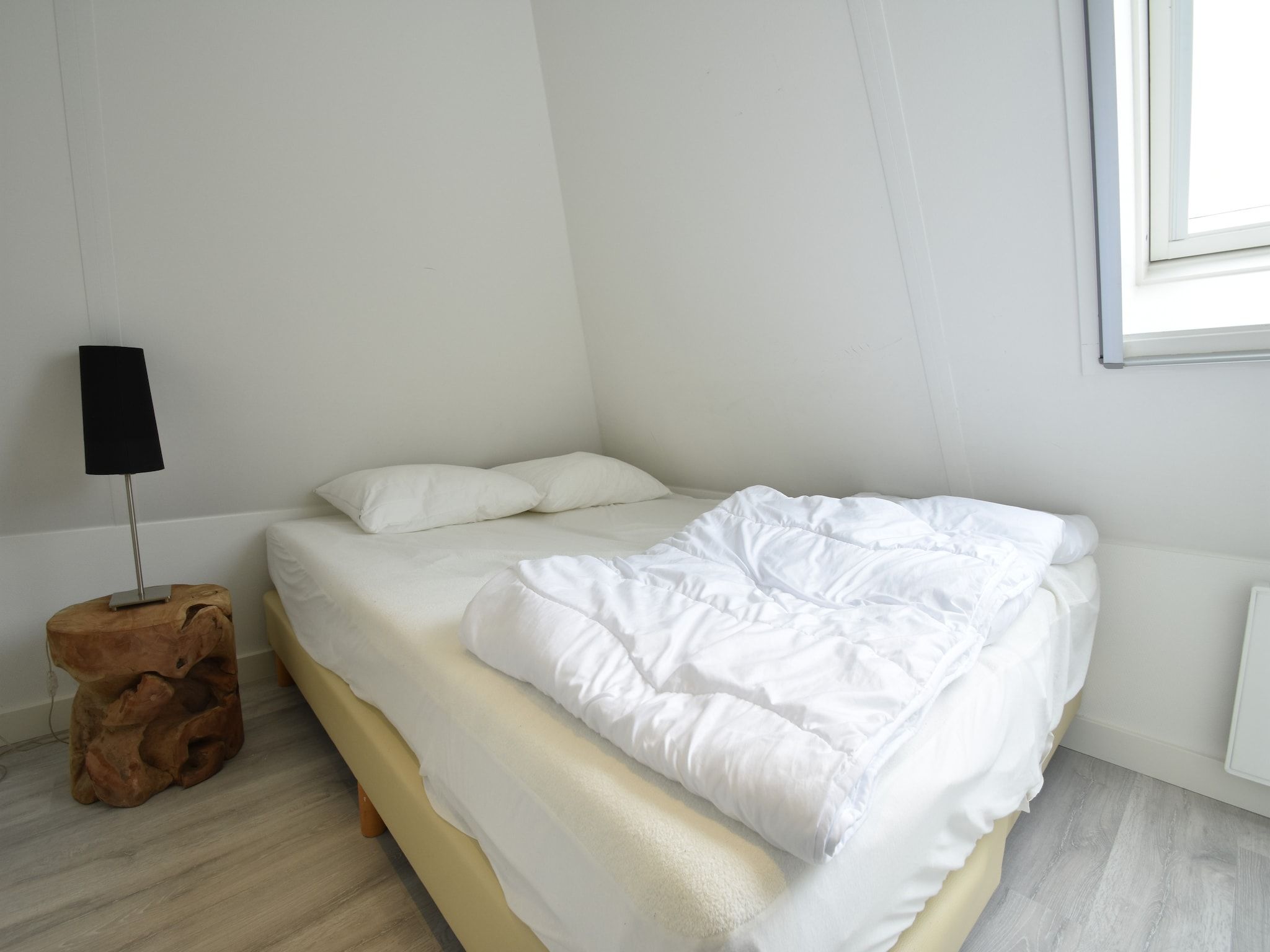 Een slaapkamer van Wellness aan het Water in Eernewolde in Earnewald