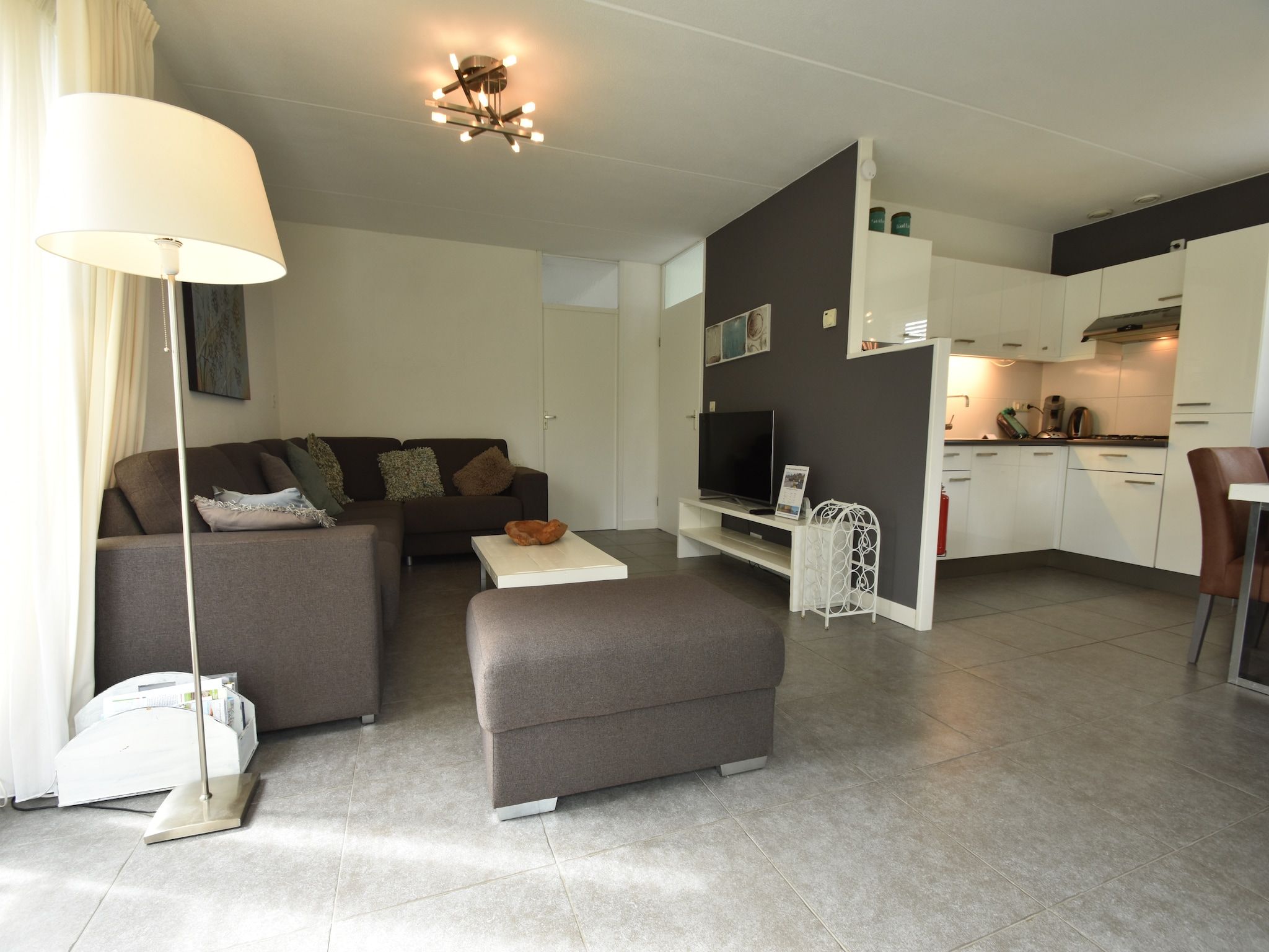 De woonkamer van Wellness aan het Water in Eernewolde in Earnewald