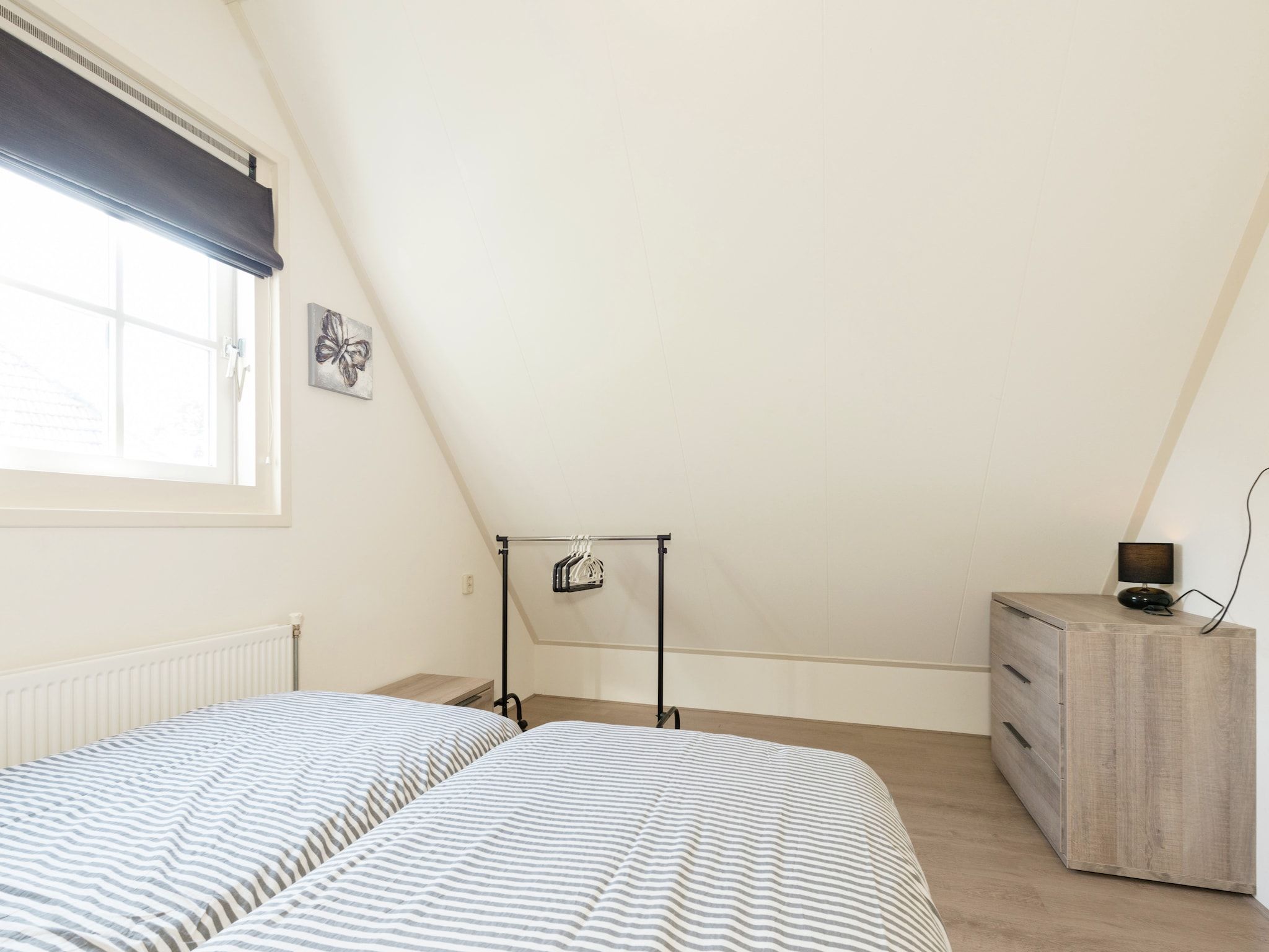 Een slaapkamer van De Grutto in Hippolytushoef