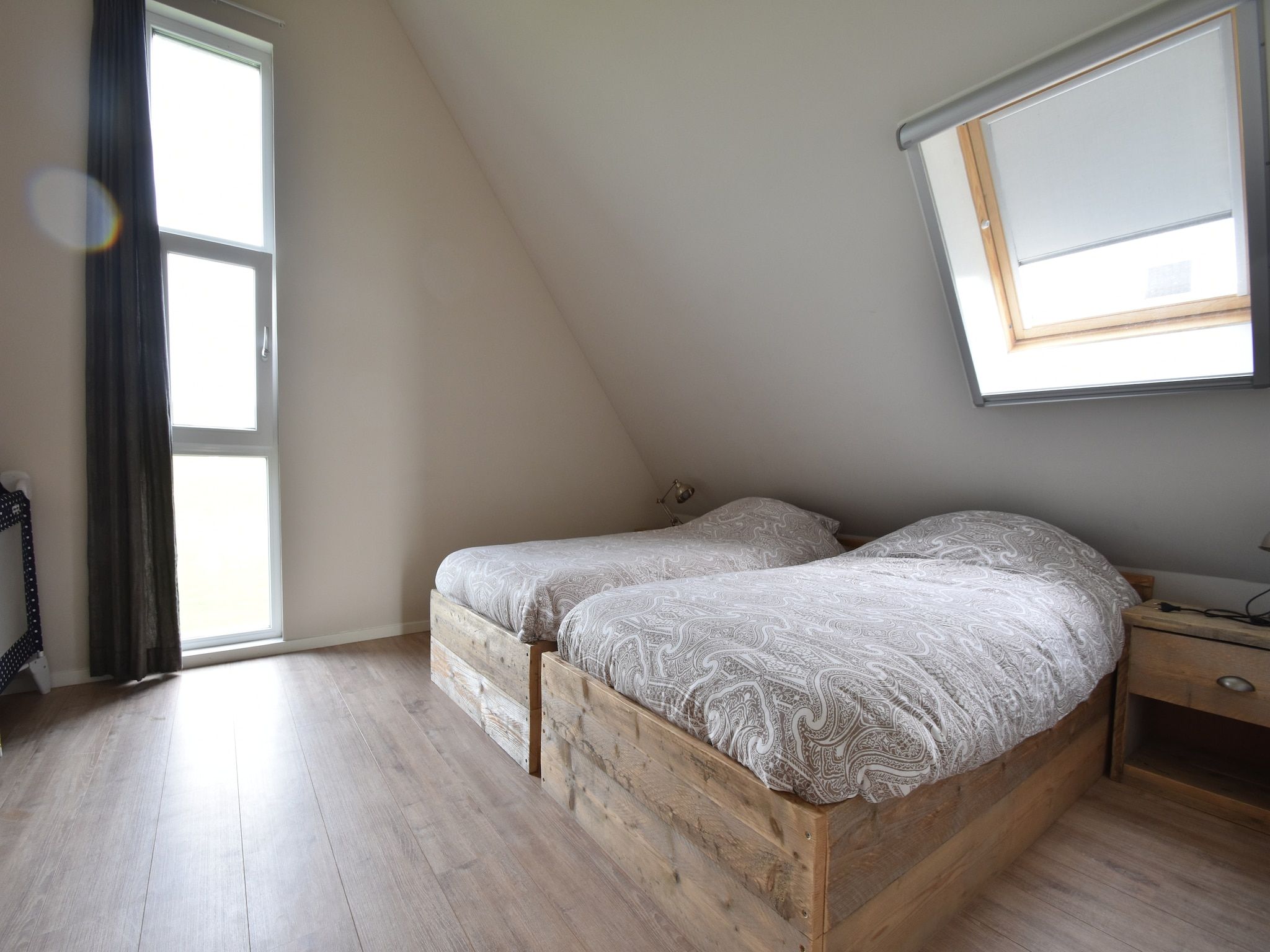 Een slaapkamer van Zeedijk I in Tzummarum