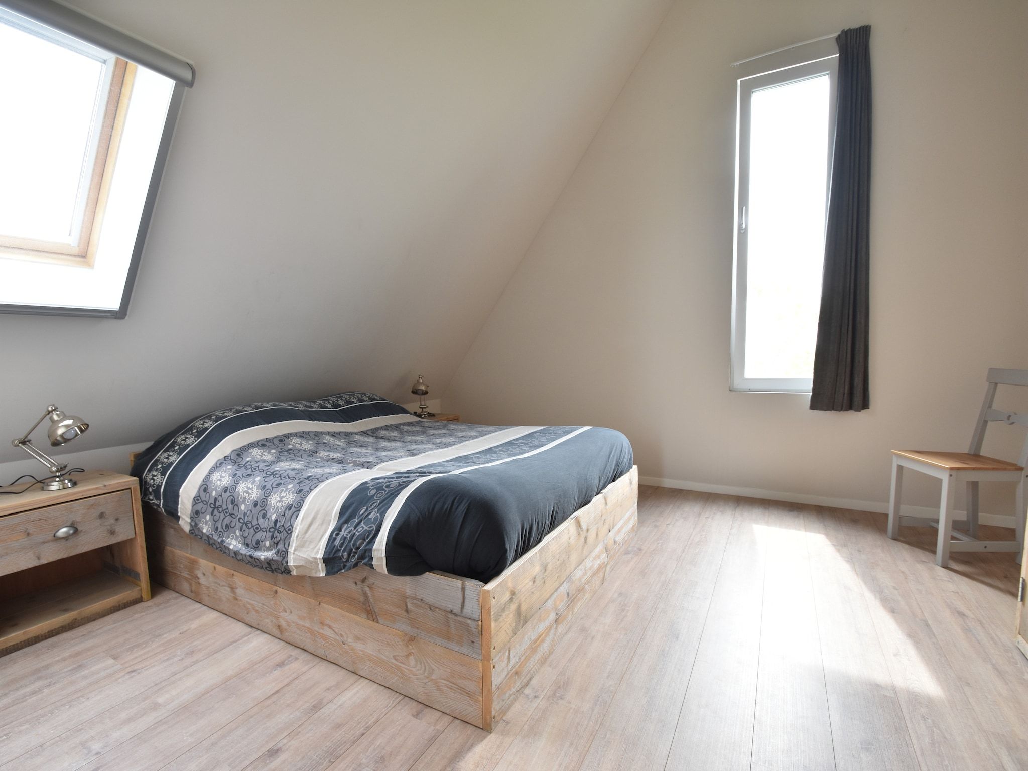 Een slaapkamer van Zeedijk I in Tzummarum