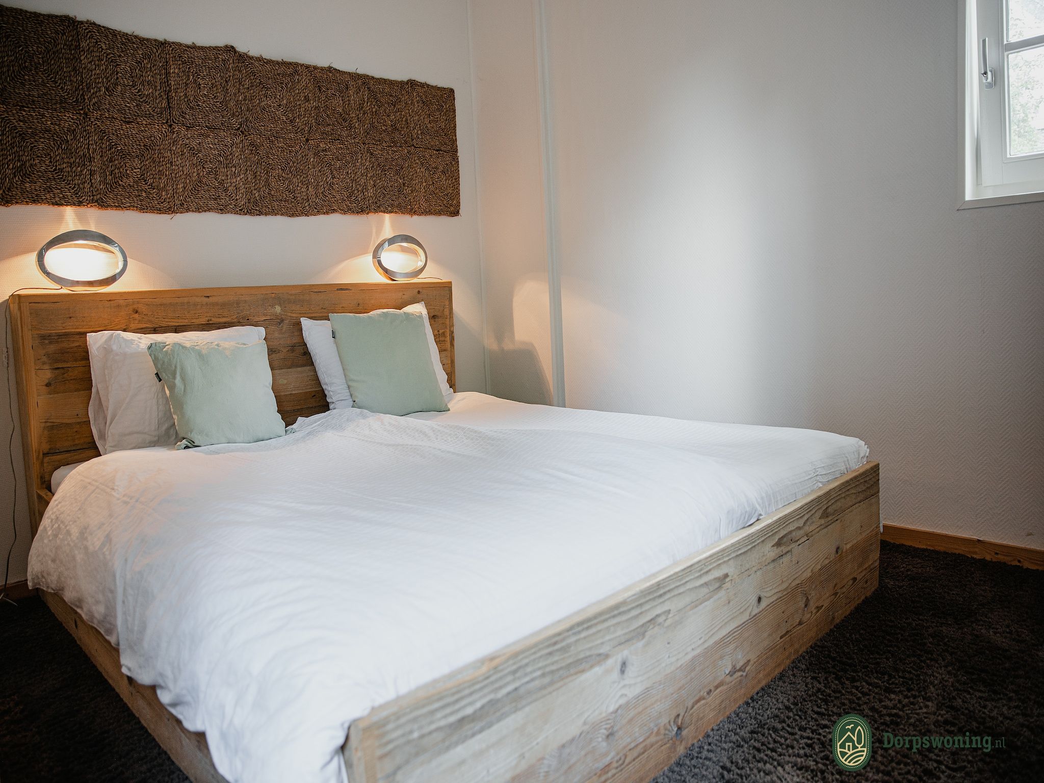 Een slaapkamer van Dorpswoning Op Niveau in Leende