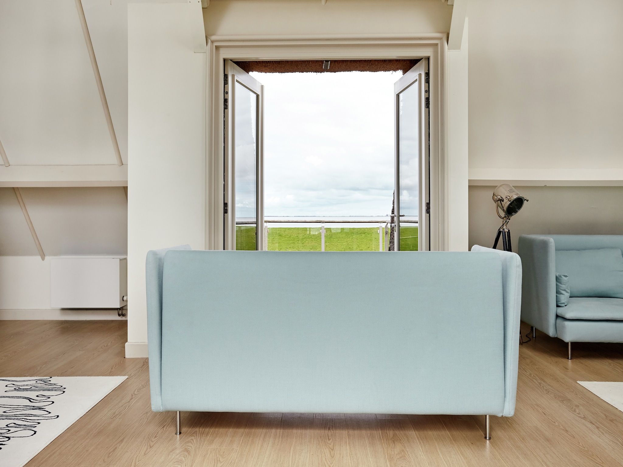 Een slaapkamer van Landhuis Wad Anders in Wierum