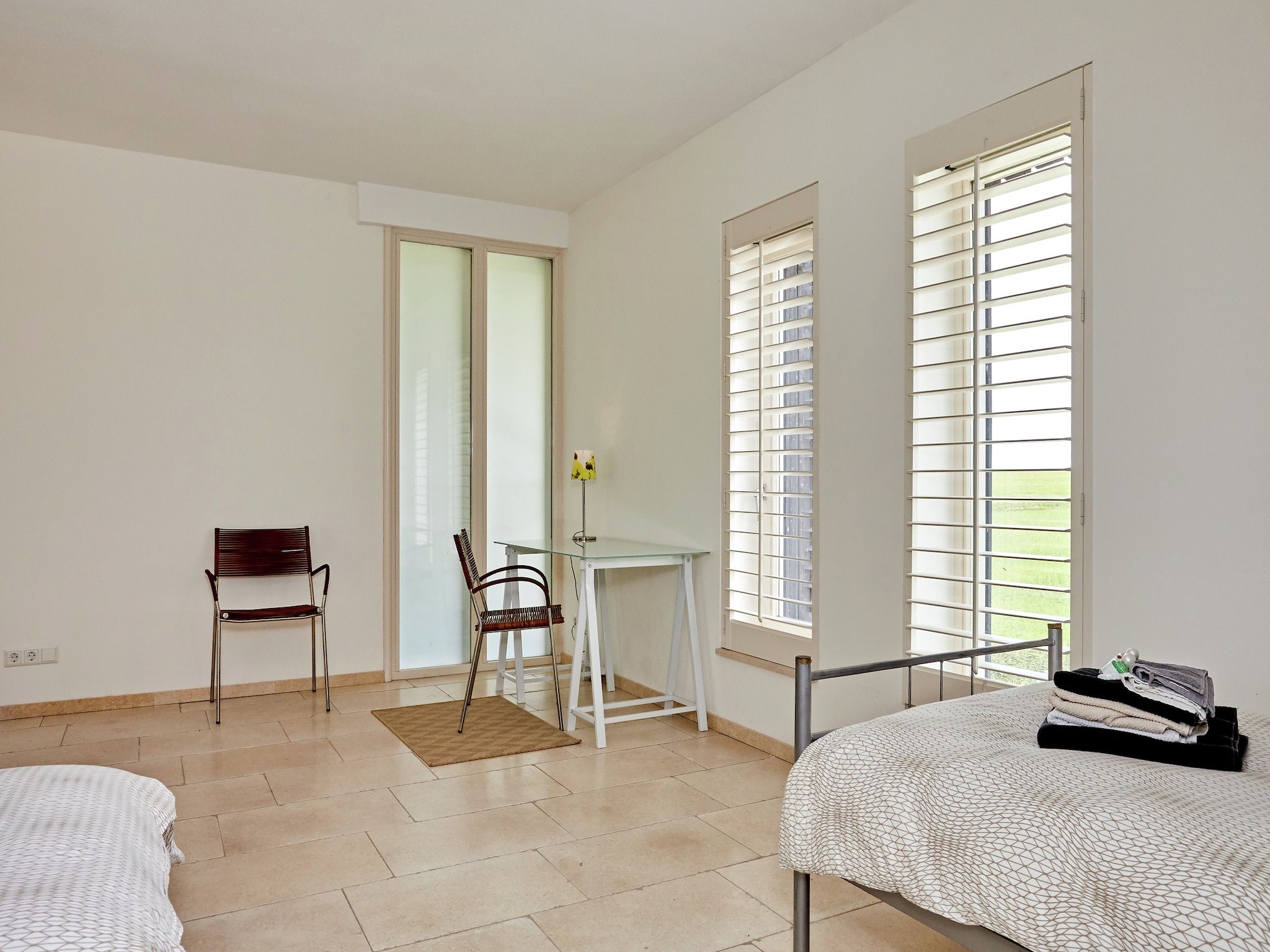 Een slaapkamer van Landhuis Wad Anders in Wierum