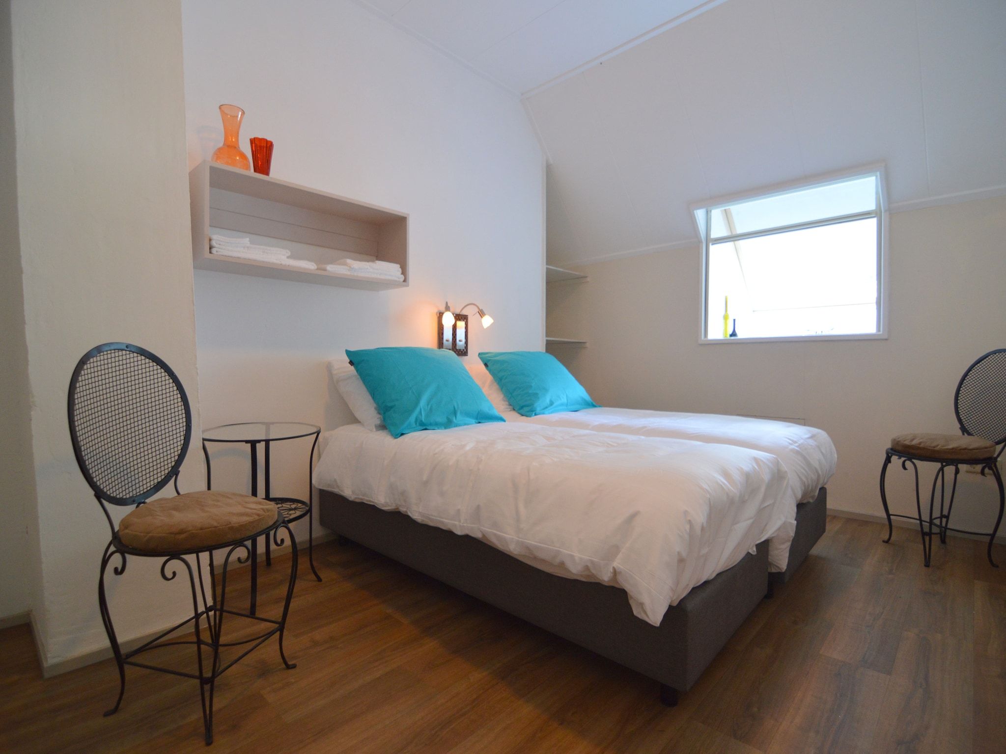 Een slaapkamer van Gelink Hof in Rekken