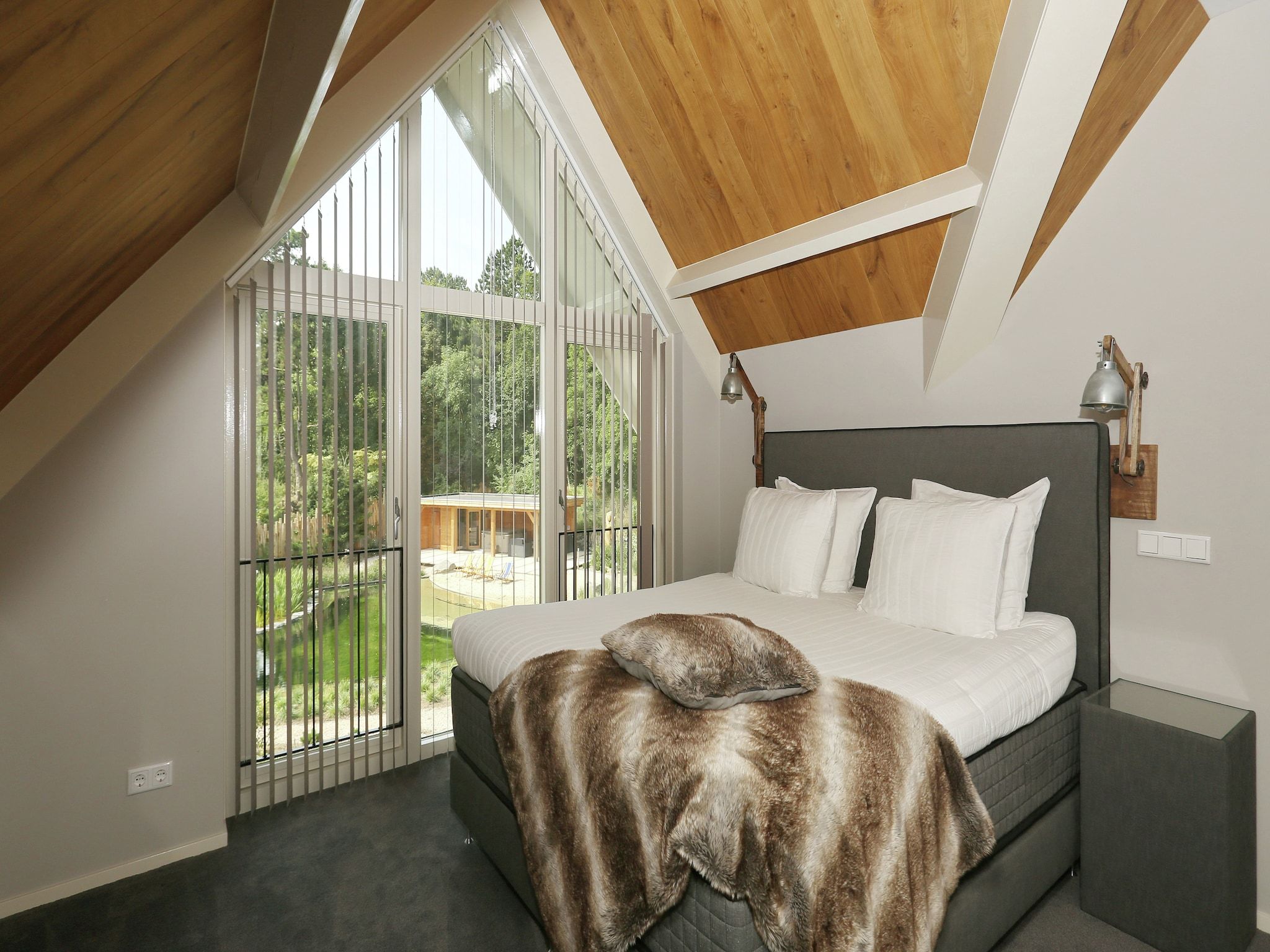 Een slaapkamer van Duinvilla Noordwijk in Noordwijk