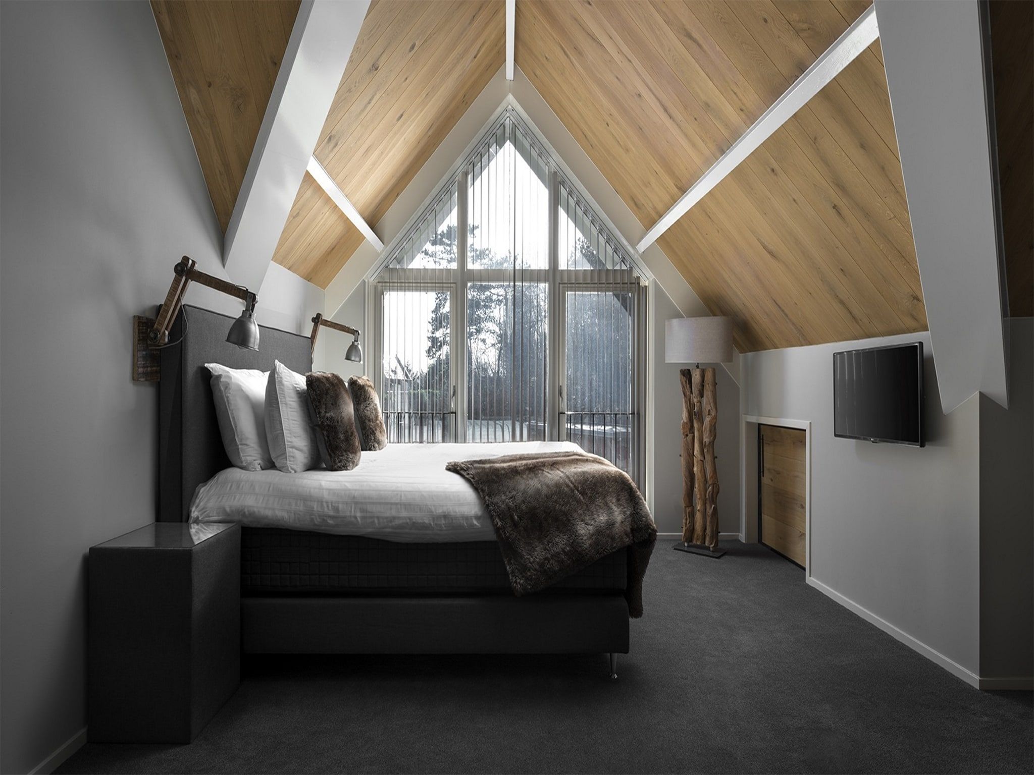 Een slaapkamer van Duinvilla Noordwijk in Noordwijk