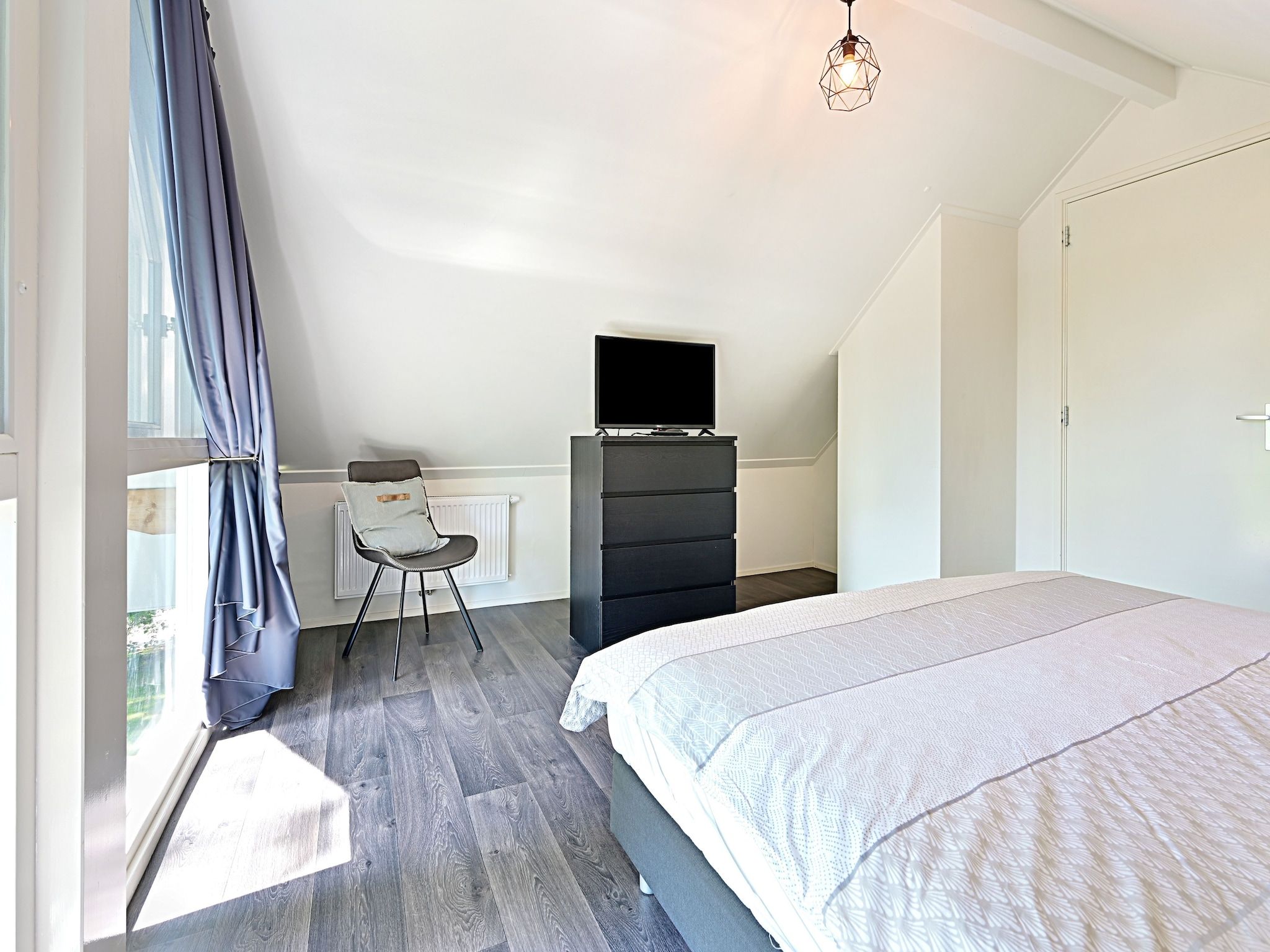 Een slaapkamer van Zijzicht in Reutum-Weerselo