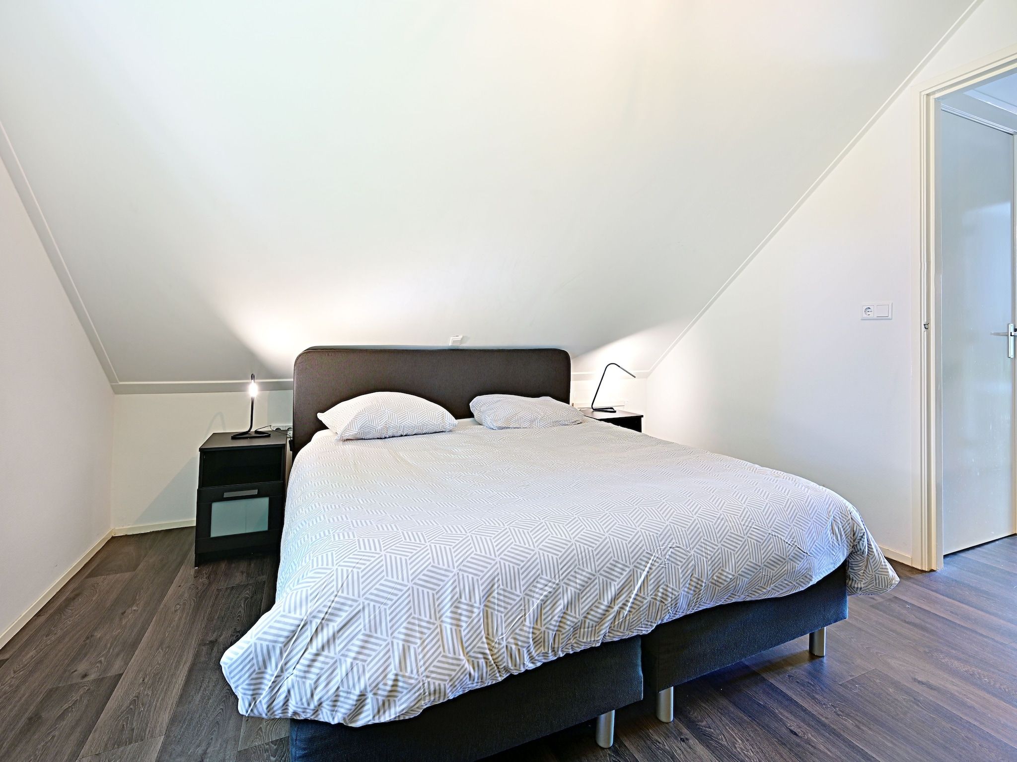 Een slaapkamer van Zijzicht in Reutum-Weerselo